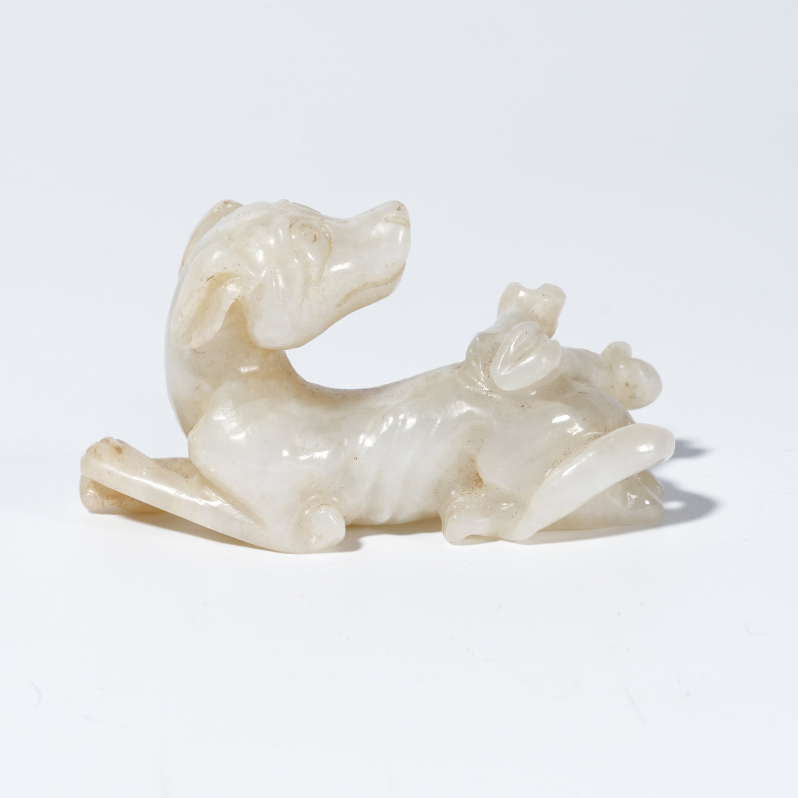 A HETIAN JADE CARVED DOG FIGURE (1 of 10)