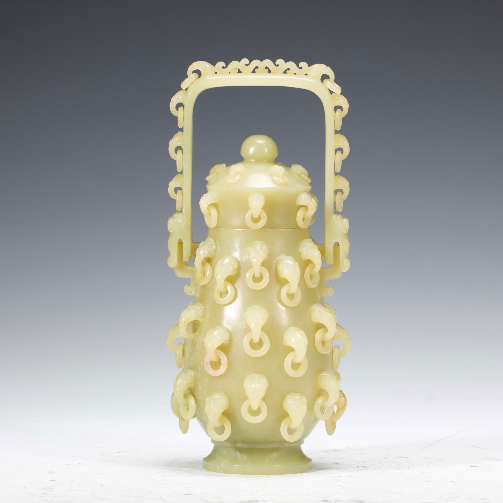 A HETIAN YELLOW JADE CARRIED-HANDLE VASE (1 of 8)