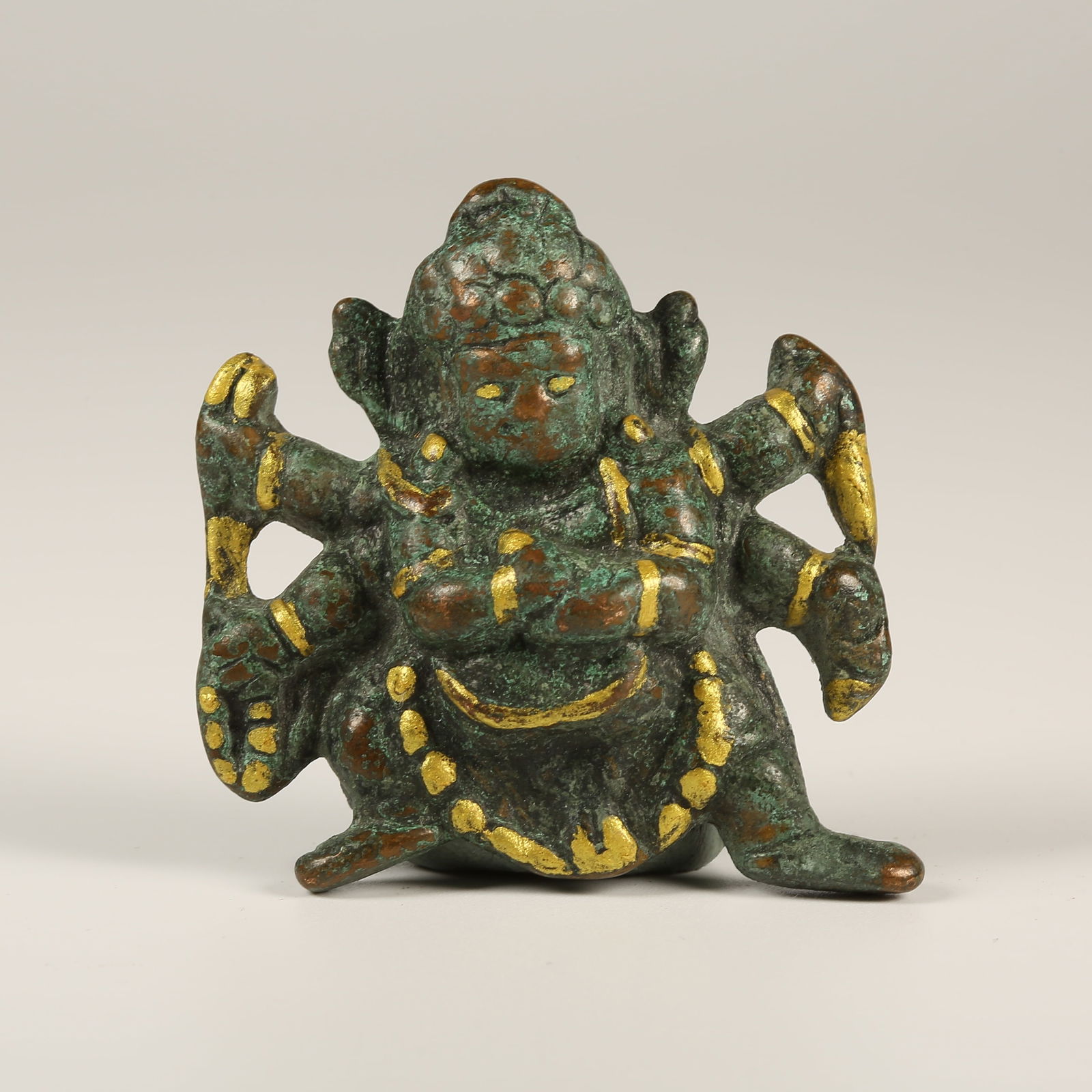 A GILT-BRONZE STATUE OF MAHAKALA (GREAT BLACK DEITY) (1 of 8)