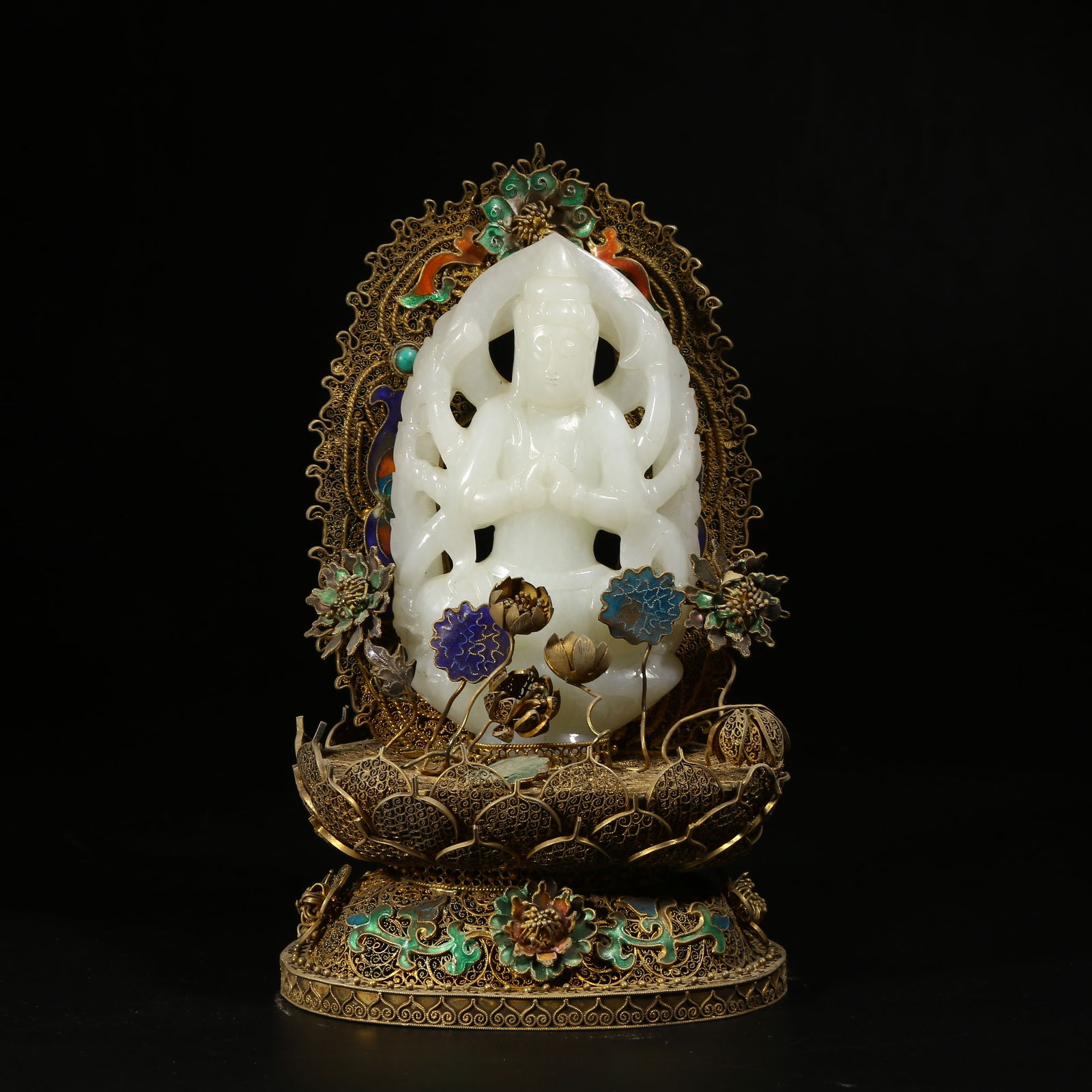 A GILDED SILVER FILIGREE BODHISATTVA INLAID WITH HETIAN JADE: Gilded silver filigree Bodhisattva inlaid with Hetian jade