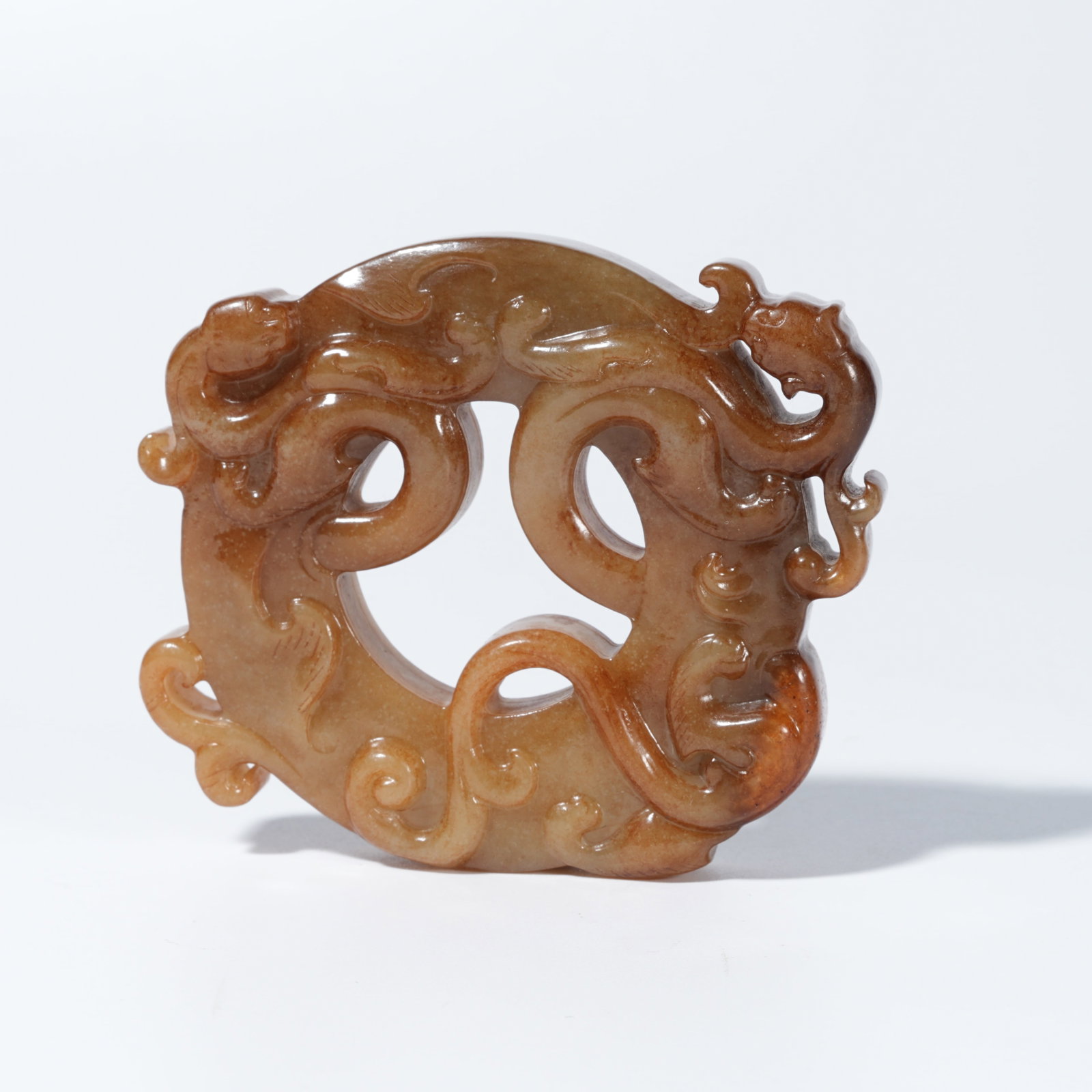 A ARCHAIC JADE CARVED DRAGON-DECORATED BI DISC (1 of 9)