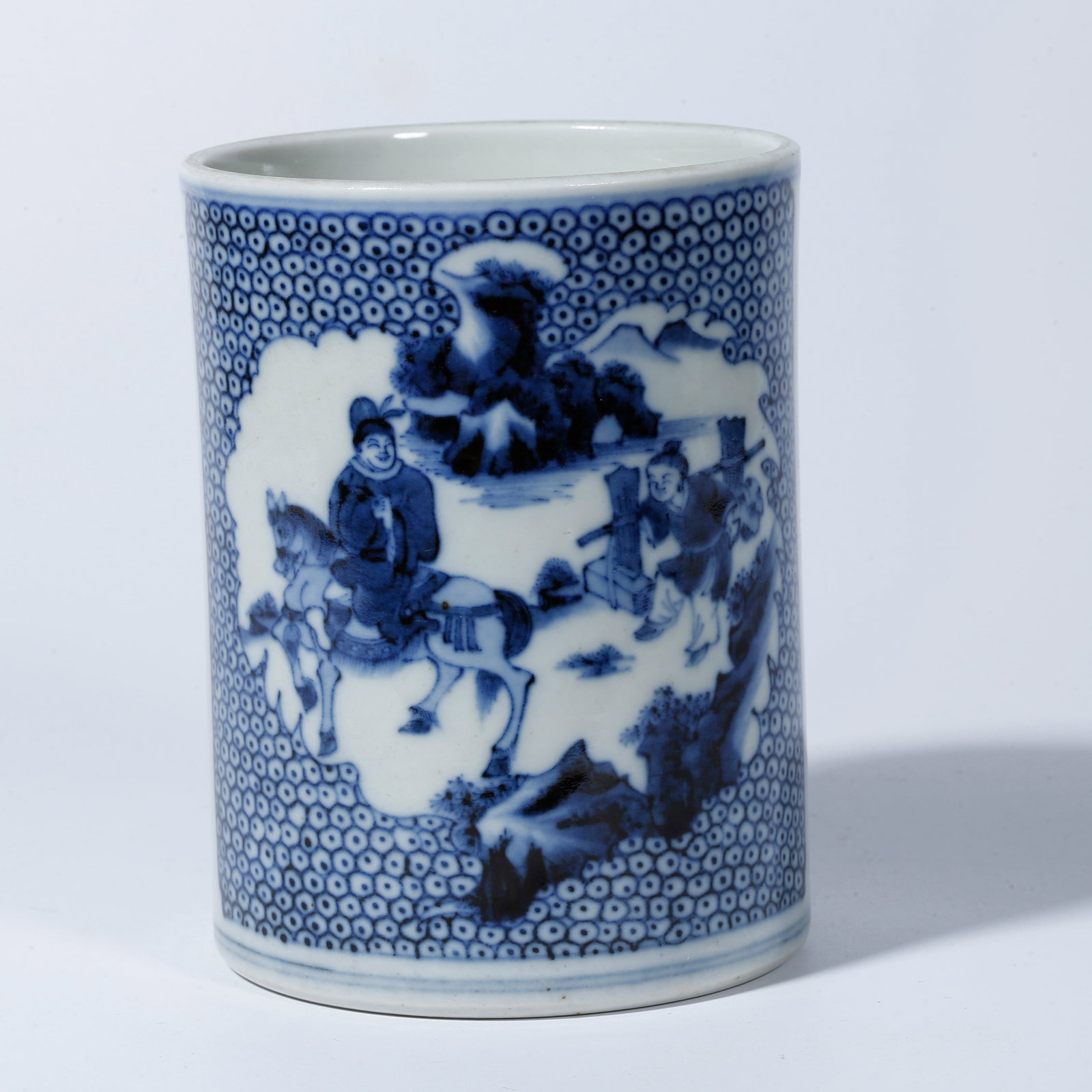 A BLUE-AND-WHITE BRUSH POT WITH FIGURAL STORY DESIGN (1 of 10)