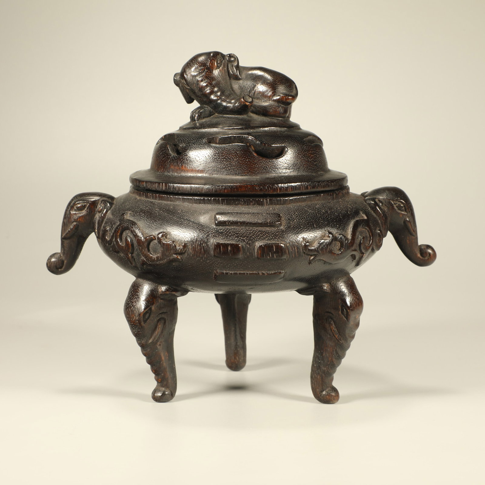 A AGARWOOD CARVED THREE-FOOT INCENSE BURNER WITH ELEPHANT FINIAL (1 of 6)