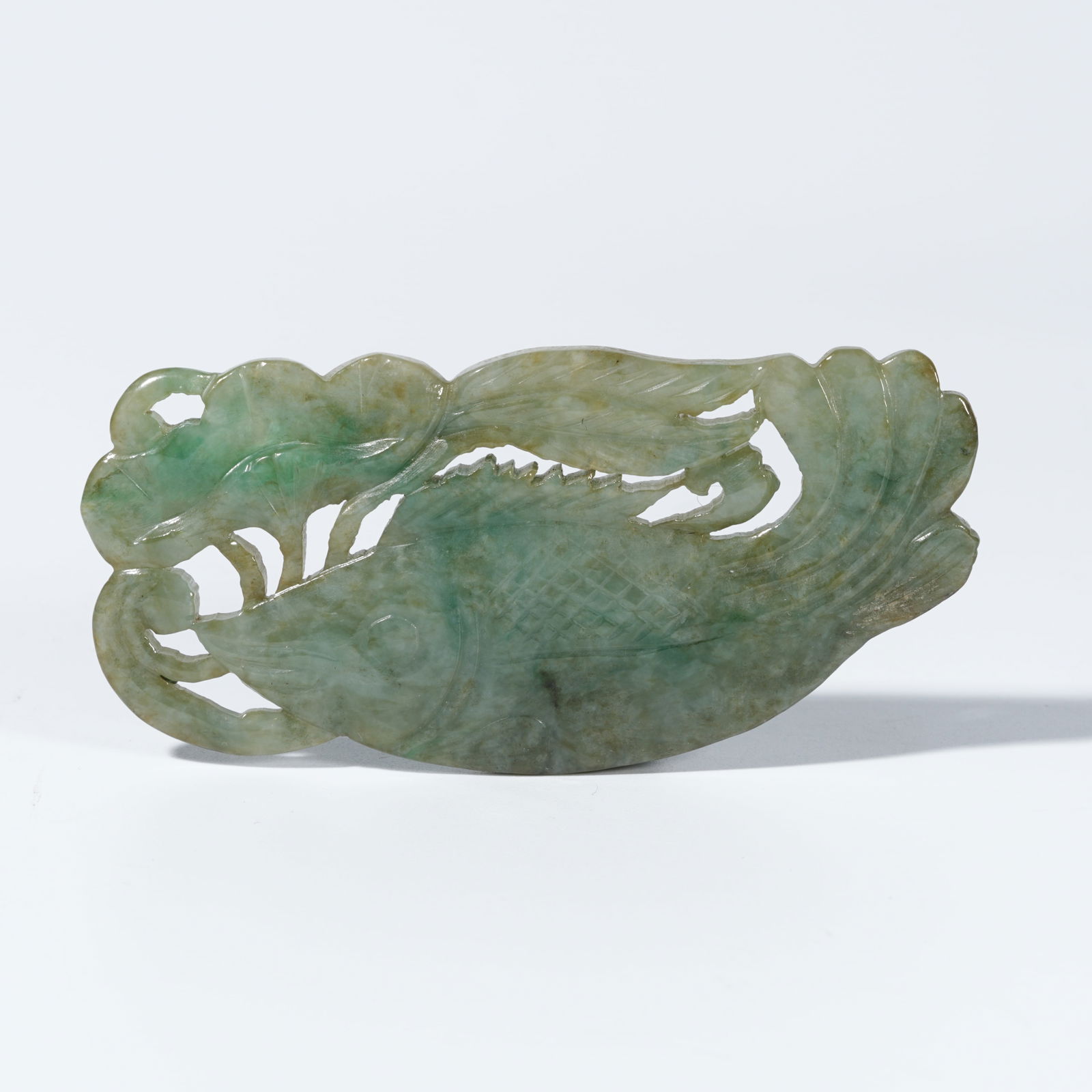 A JADEITE CARVED "ABUNDANCE YEAR AFTER YEAR" PENDANT (1 of 10)