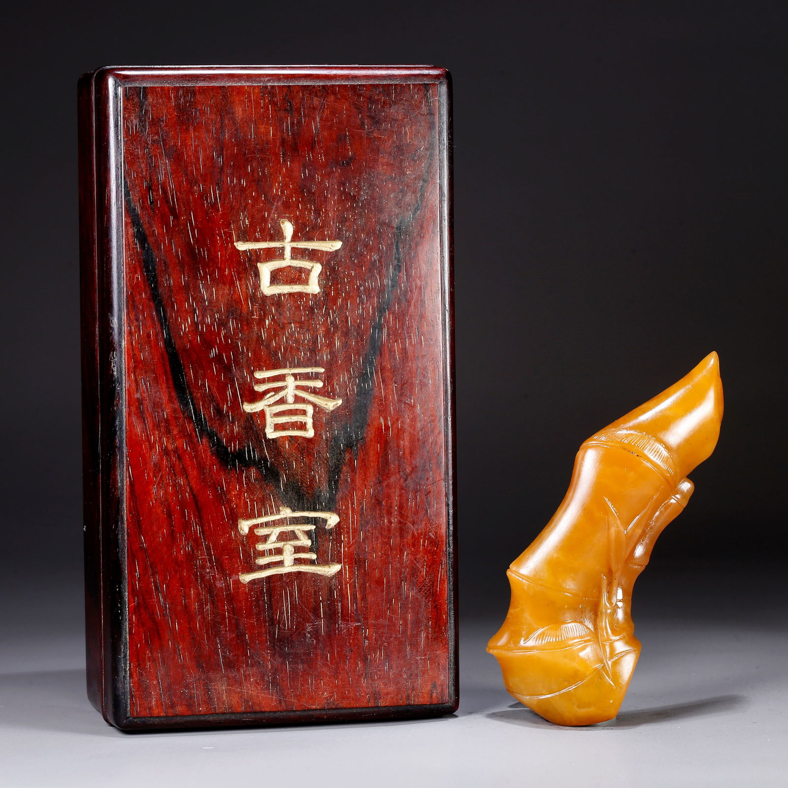 A SHOUSHAN TIANHUANG STONE SEAL CARVED IN BAMBOO FORM: Shoushan Tianhuang stone seal carved in bamboo form