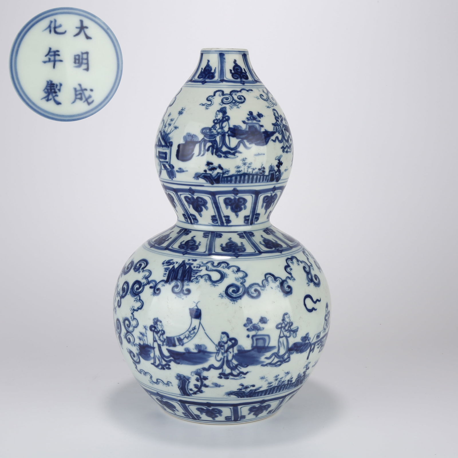A BLUE-AND-WHITE GOURD VASE WITH QIN, CHESS, CALLIGRAPHY, AND PAINTING MOTIF (1 of 9)