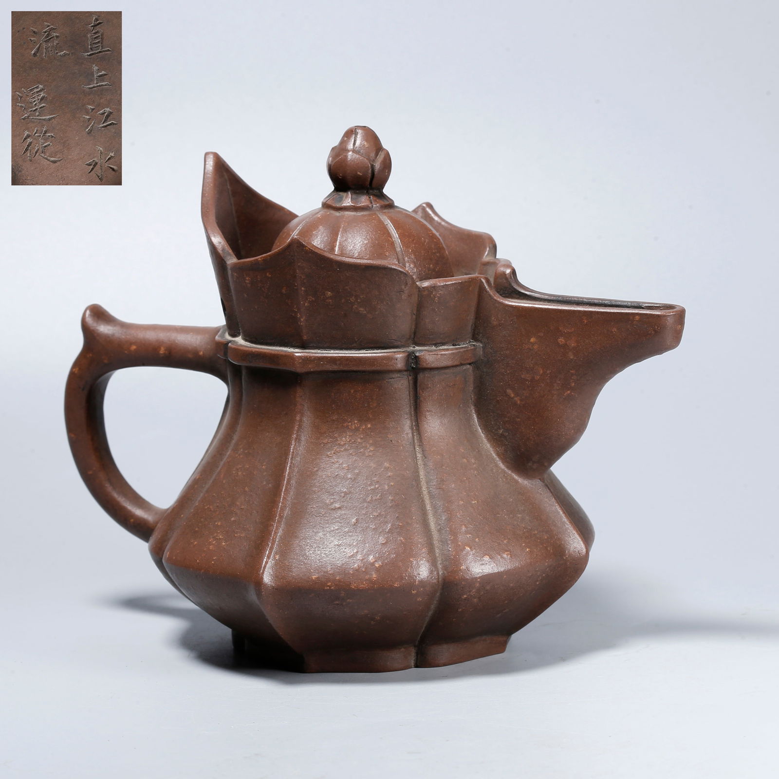A ZISHA CARVED EWER: Zisha Carved Ewer
