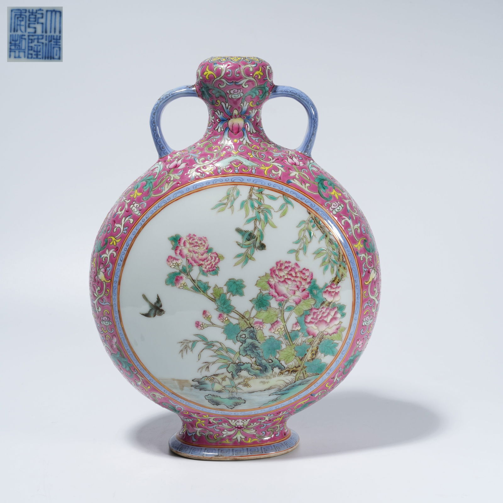 A FAMILLE-ROSE MOONFLASK WITH FLOWER-AND-BIRD MOTIF: Famille-Rose Moonflask with Flower-and-Bird Motif
