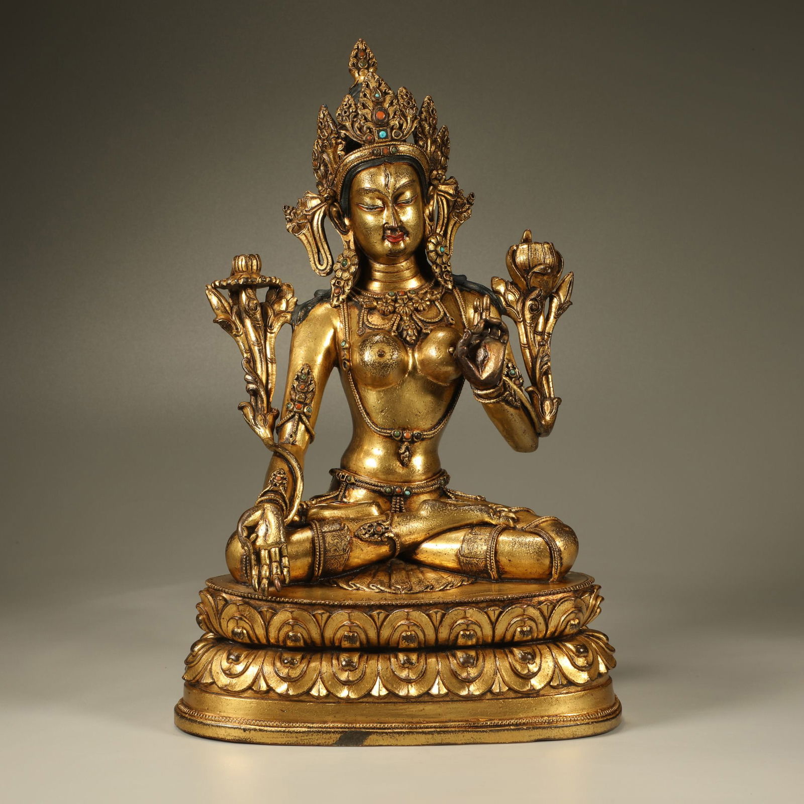 A GILT-BRONZE GREEN TARA FIGURE (1 of 7)