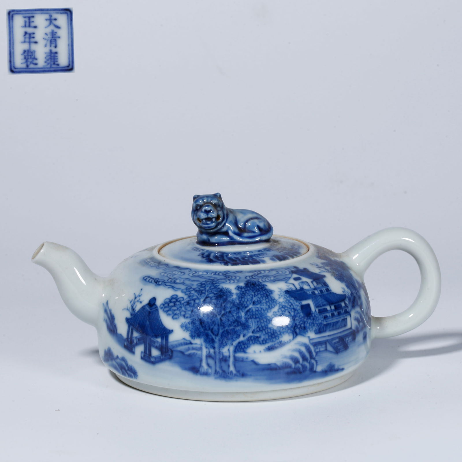 A BLUE-AND-WHITE EWER WITH LANDSCAPE AND FIGURE DESIGN: Blue-and-White Ewer with Landscape and Figure Design