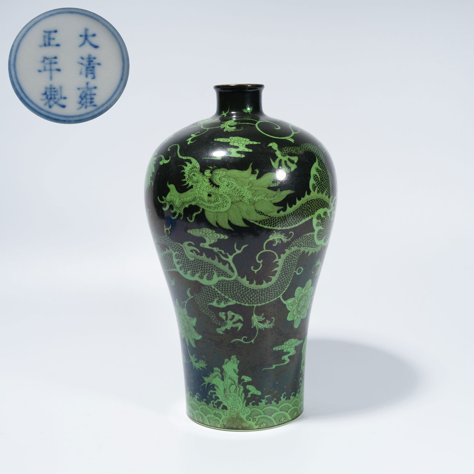 A BLACK-GROUND GREEN-GLAZED PLUM VASE WITH SEA-AND-DRAGON MOTIF: Black-Ground Green-Glazed Plum Vase with Sea-and-Dragon Motif