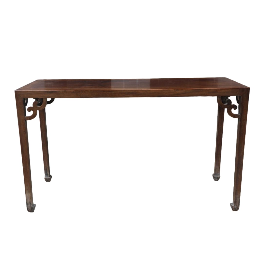 A HUANGHUALI CARVED SCROLL-PATTERN RECTANGULAR TABLE (1 of 7)