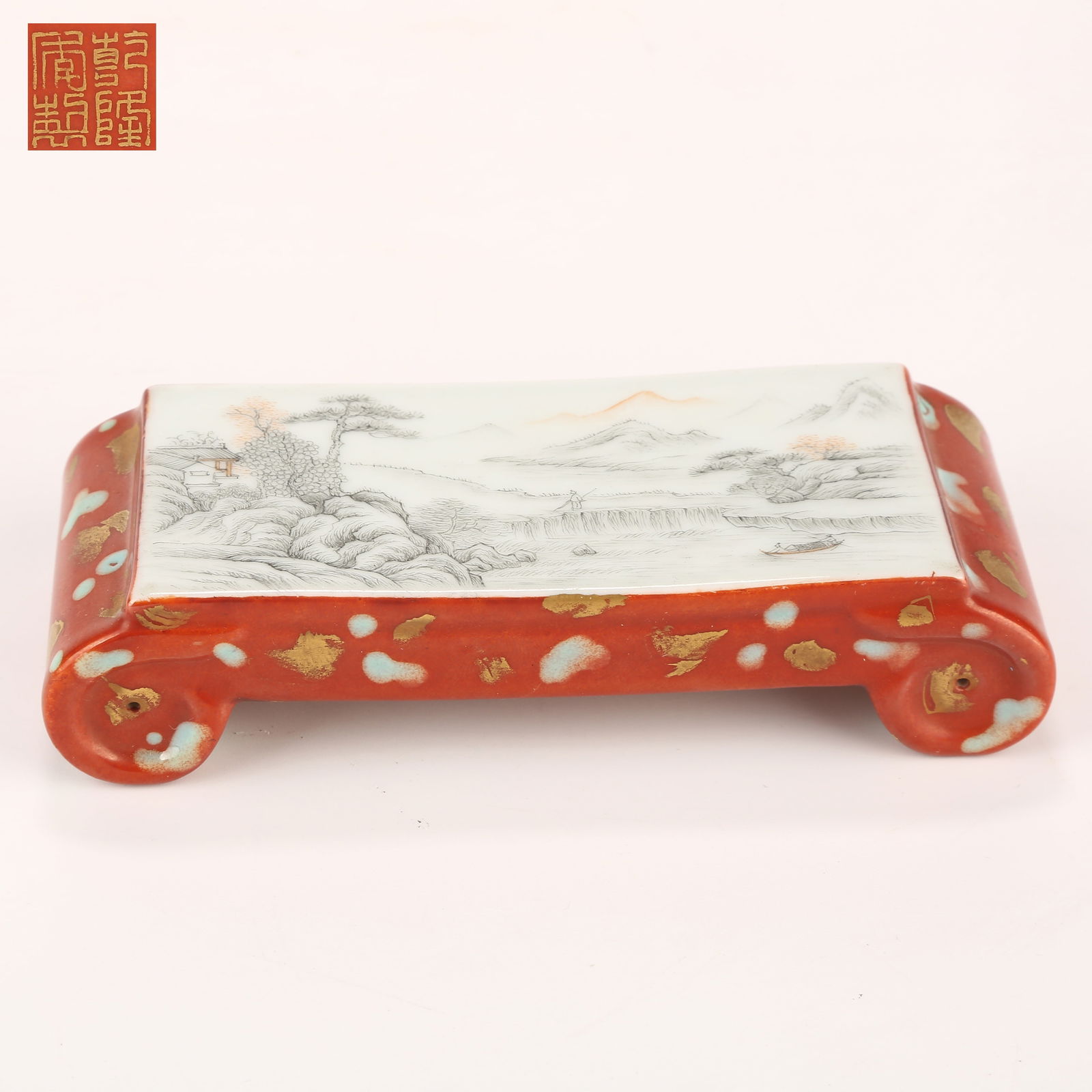 A INK-PAINTED BRUSH REST WITH LANDSCAPE MOTIF: Ink-painted brush rest with landscape motif