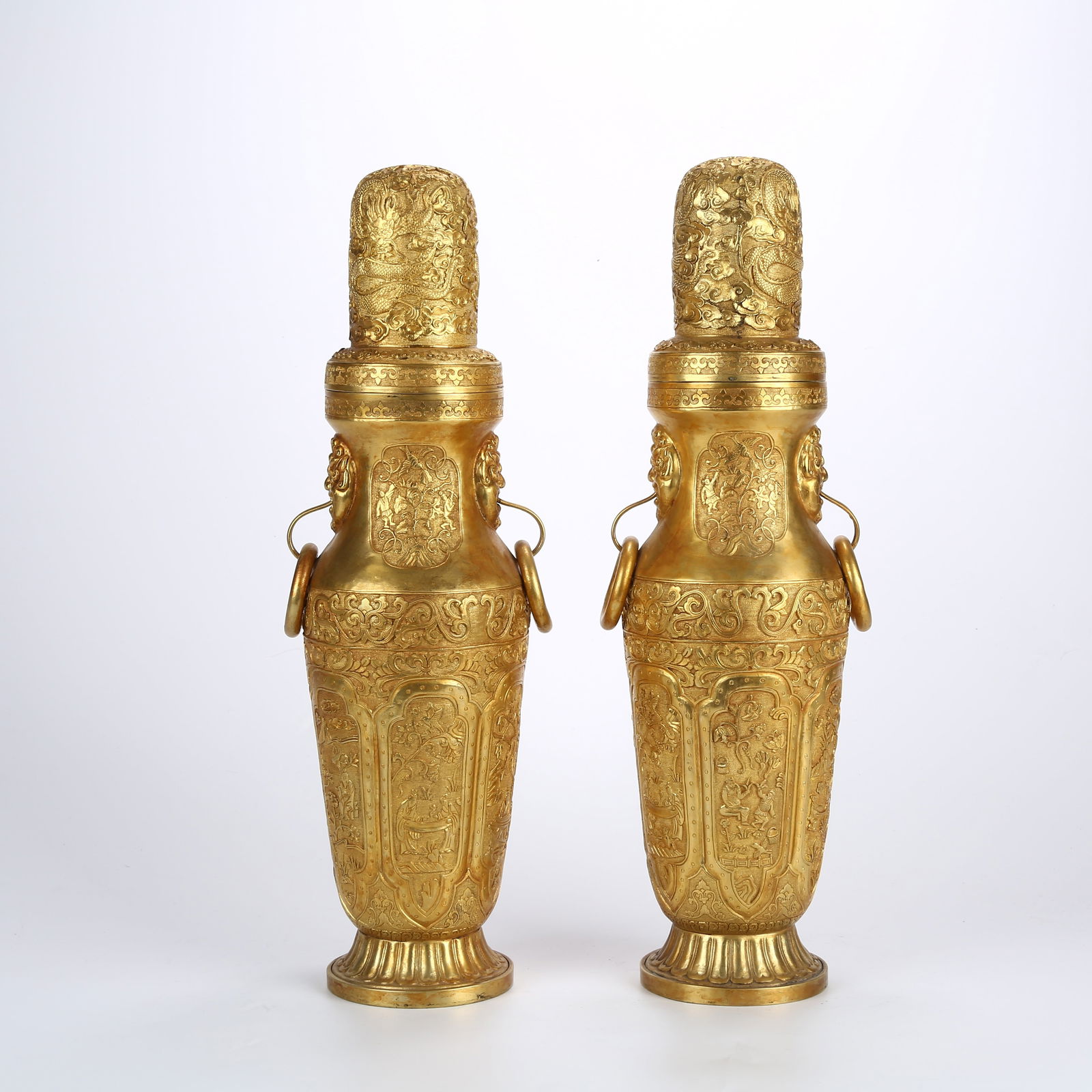 A SET OF GILT-BRONZE VASES WITH SCHOLAR FIGURES AND MOVABLE RING HANDLES (1 of 12)