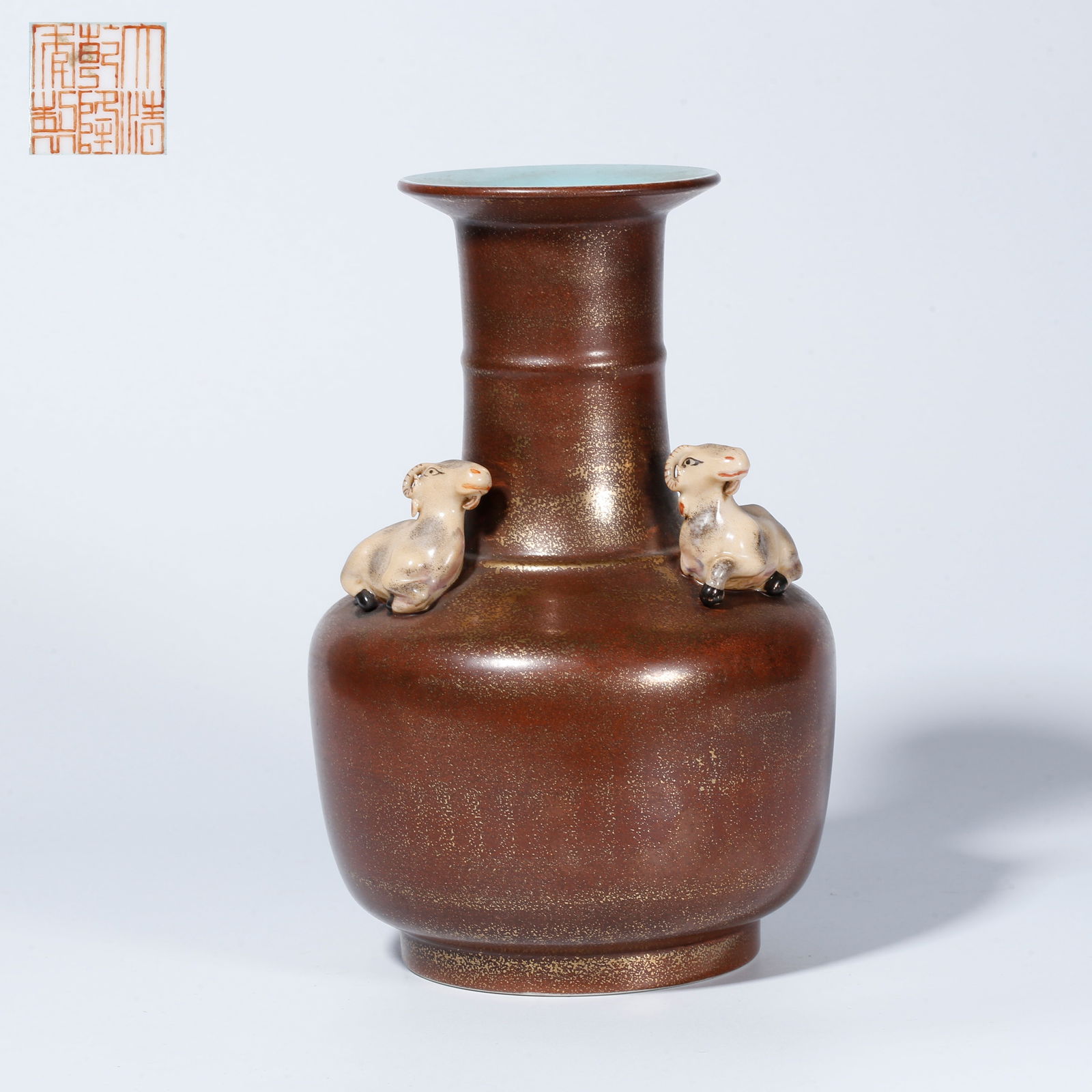 A BRONZE GLAZE MOUTH-RIM VASE WITH THREE GOATS AND AUSPICIOUSNESS DESIGN: Bronze Glaze Mouth-Rim Vase with Three Goats and Auspiciousness Design