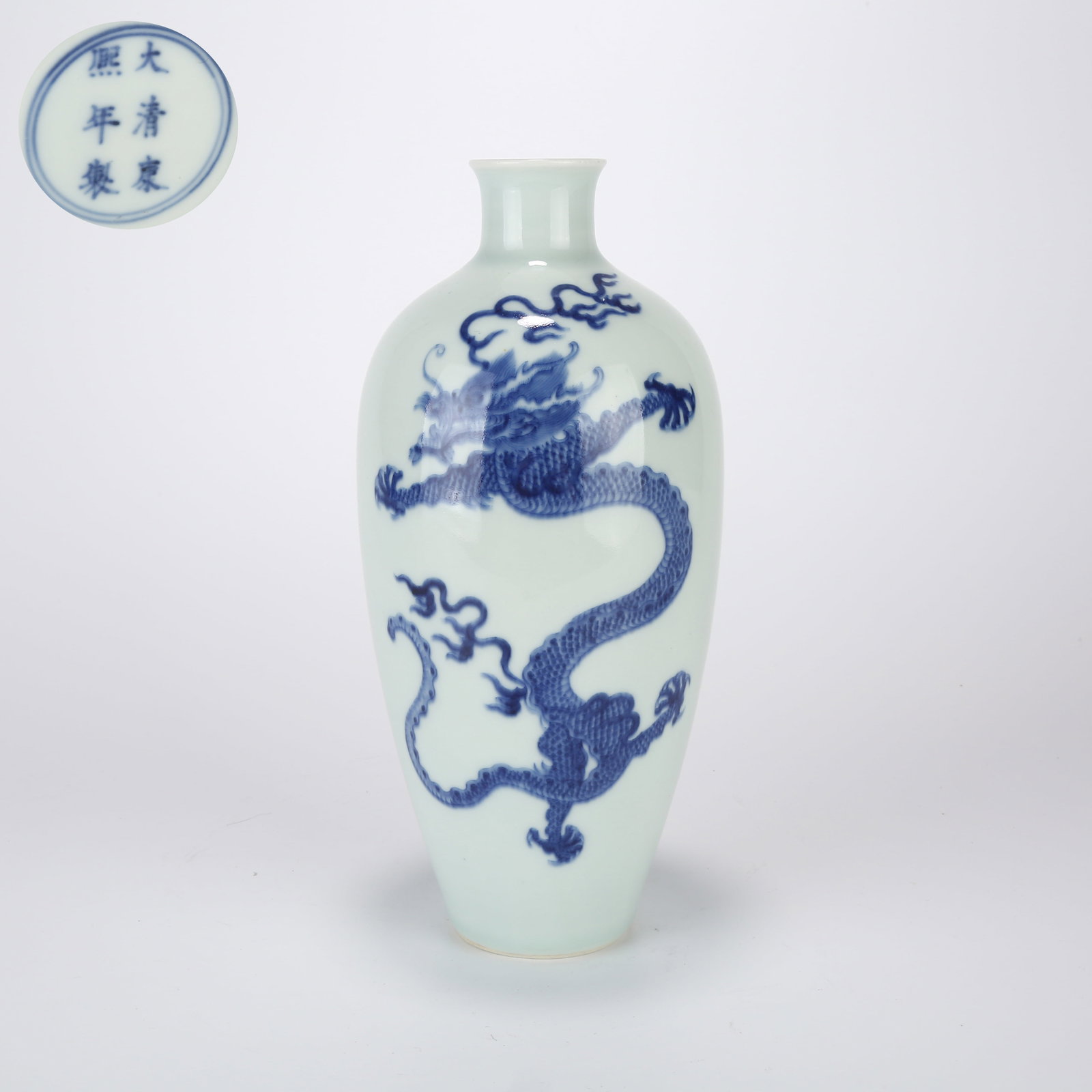A BLUE-AND-WHITE APPRECIATION VASE WITH DRAGON MOTIF: Blue-and-white appreciation vase with dragon motif