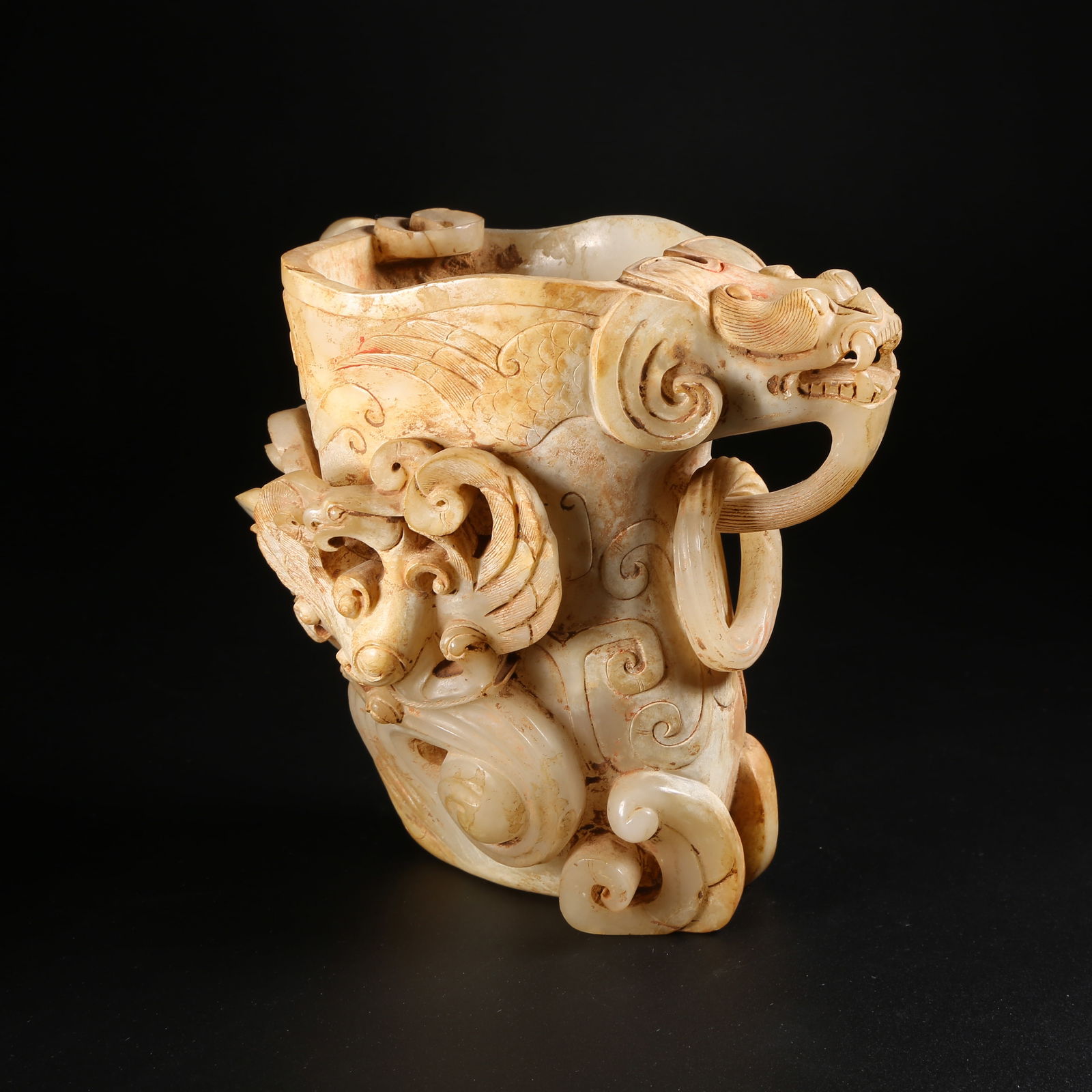 A ARCHAIC JADE CUP WITH PHOENIX MOTIFS AND MOVABLE RING HANDLE (1 of 9)