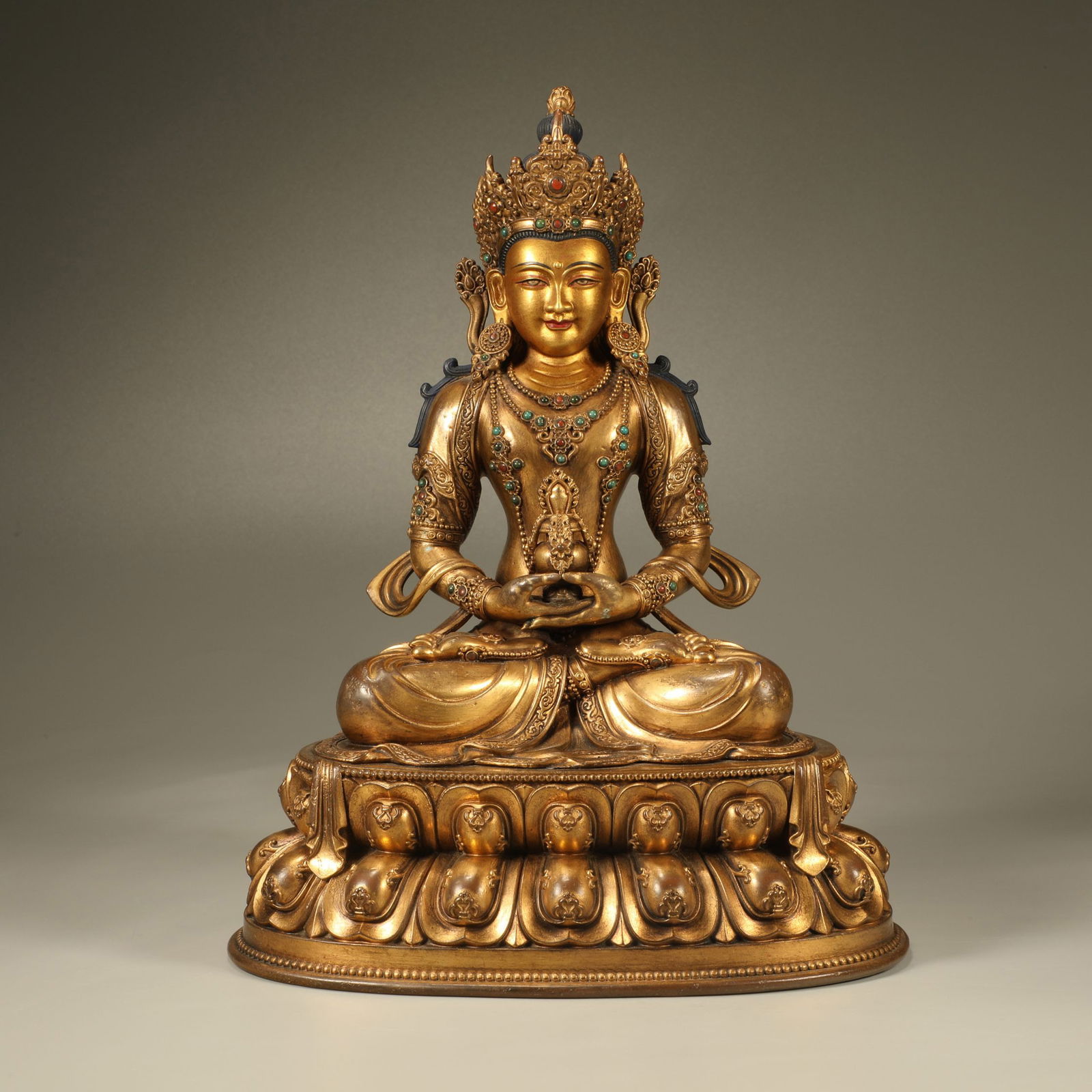 A GILT-BRONZE AMITAYUS BUDDHA FIGURE (1 of 7)