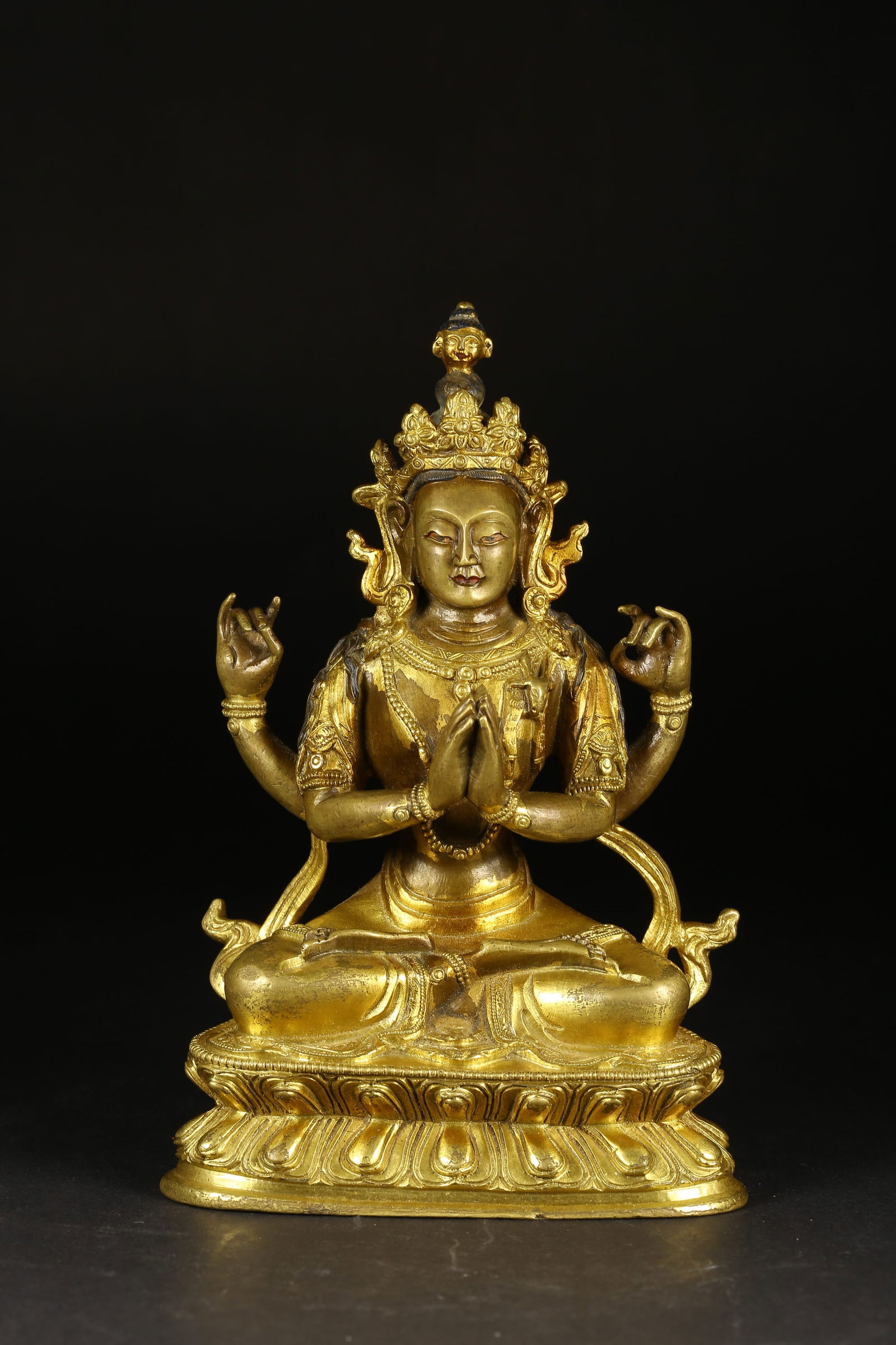 A GILT-BRONZE FOUR-ARMED AVALOKITESHVARA STATUE: Gilt-Bronze Four-Armed Avalokiteshvara Statue