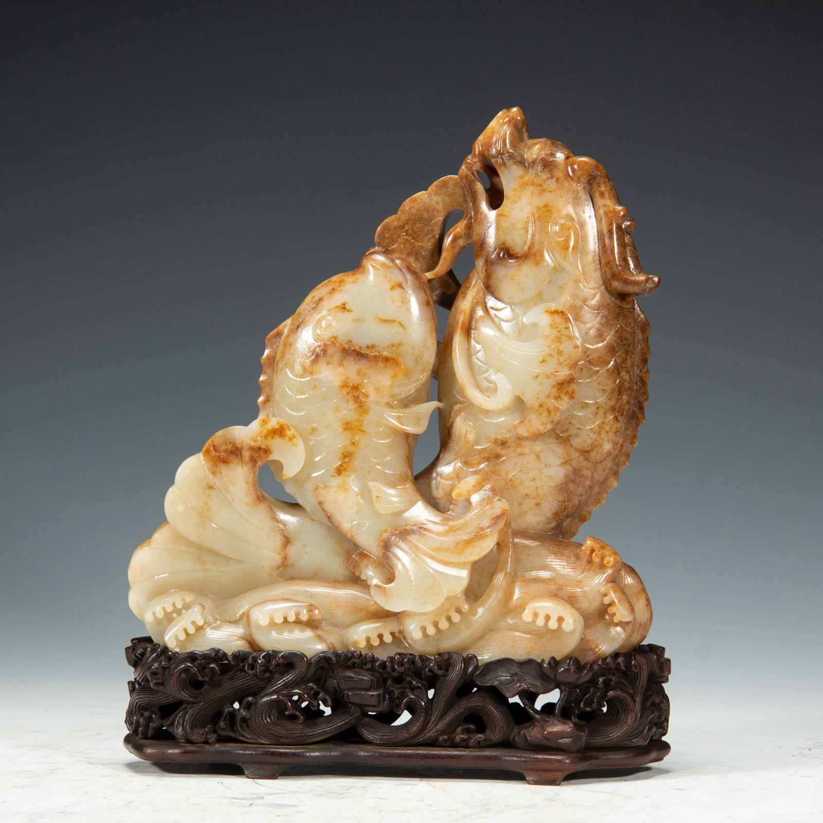 A HETIAN JADE FISH-TRANSFORMING-INTO-DRAGON FIGURE (1 of 9)