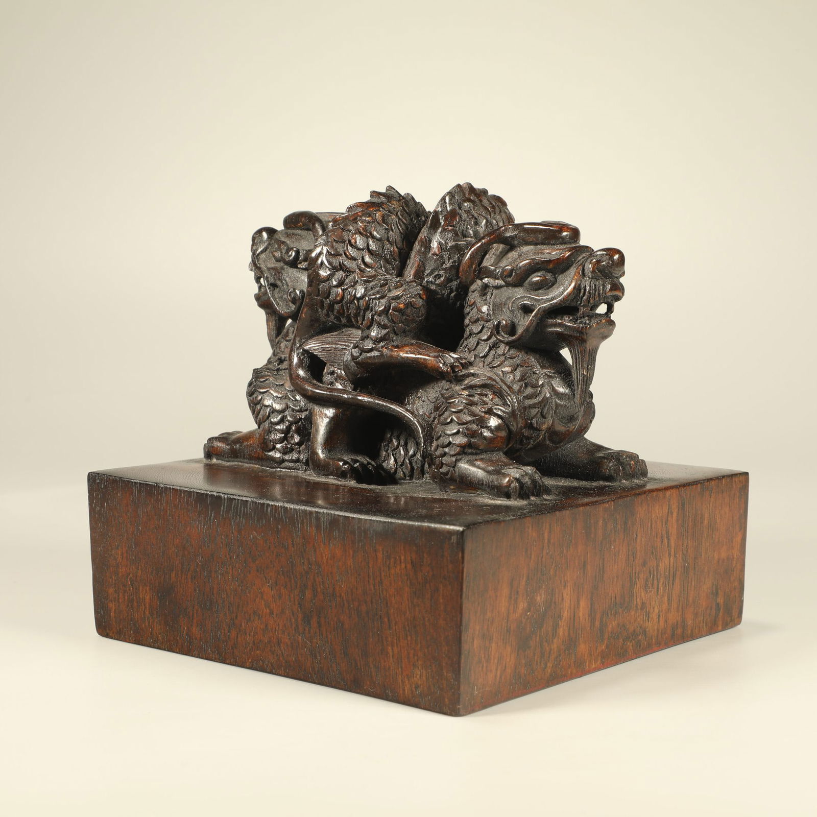 A AGARWOOD CARVED SEAL WITH DOUBLE-DRAGON FINIAL: Agarwood Carved Seal with Double-Dragon Finial