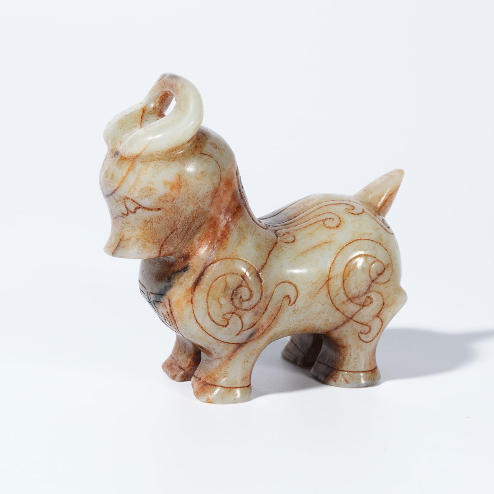 A HETIAN JADE CARVED KUI-BULL FIGURE (1 of 9)