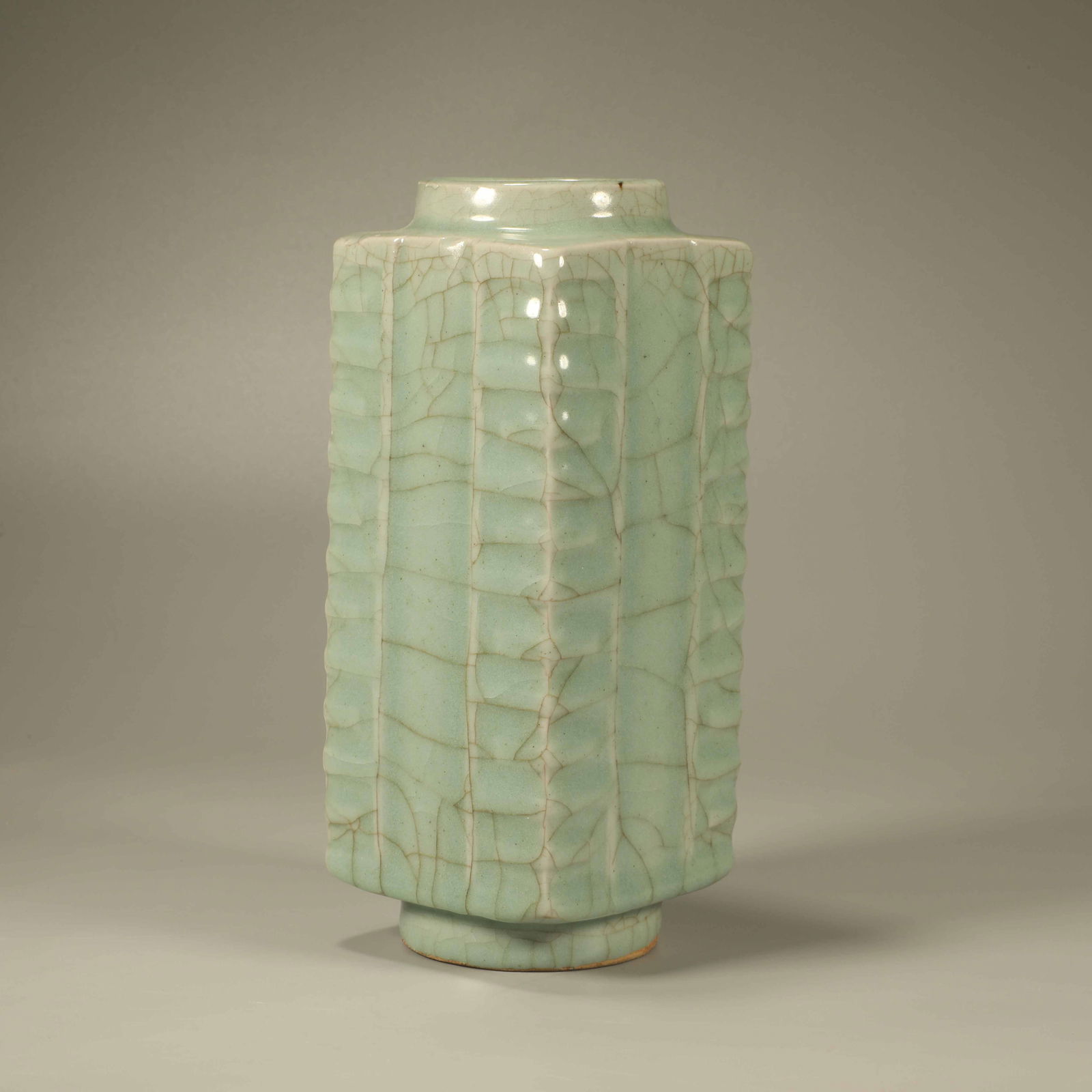 A CELADON-GLAZED CRACKED-GLAZE CONG-FORM VASE (1 of 7)
