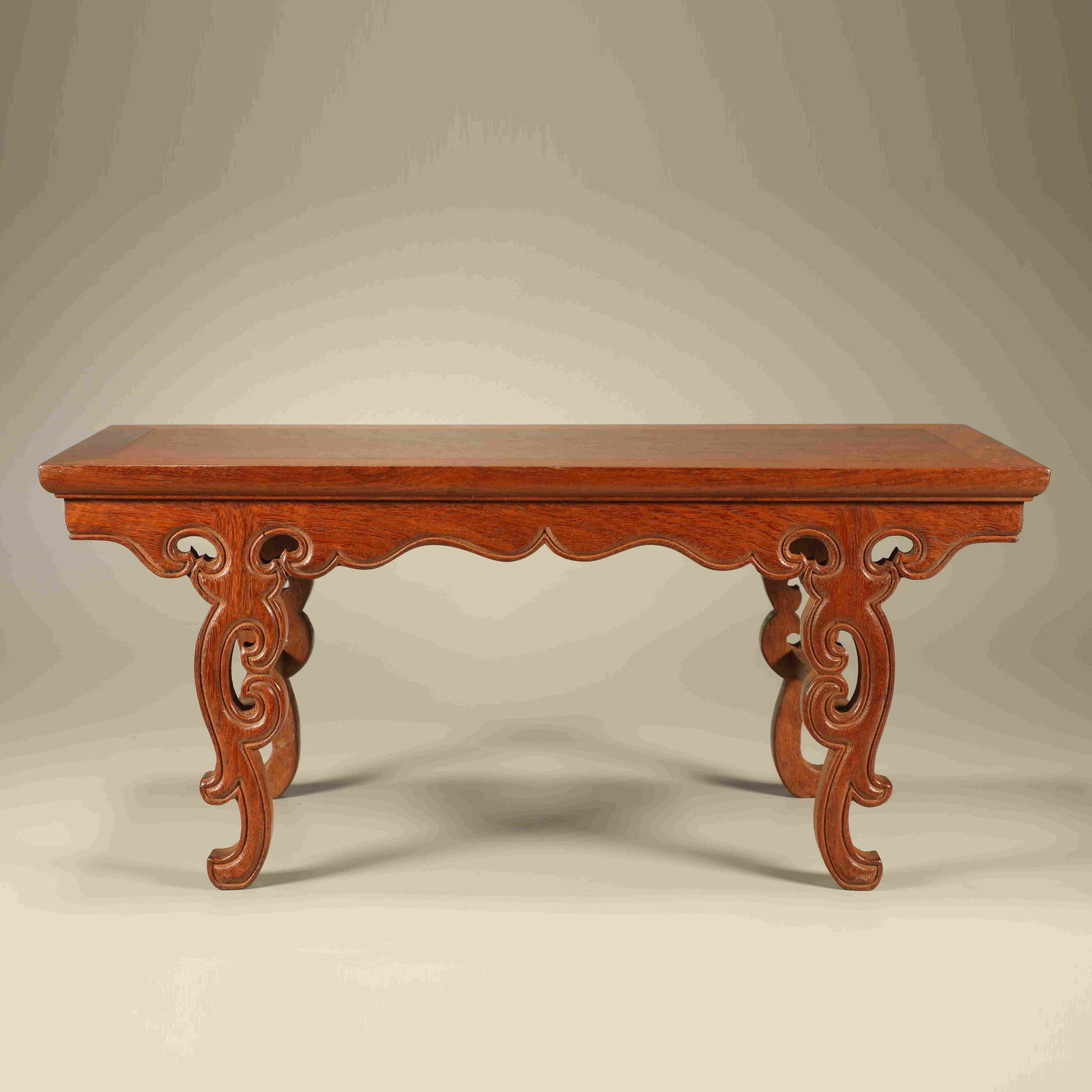 A HUANGHUALI LOW TABLE WITH LINGZHI AND RUYI MOTIF: Huanghuali Low Table with Lingzhi and Ruyi Motif