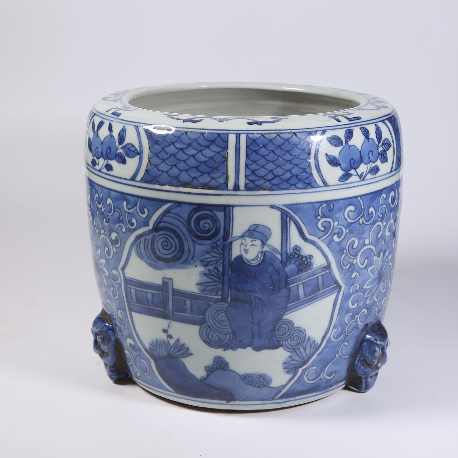 A BLUE-AND-WHITE "WINDOWED" TRIPOD CENSER WITH FIGURAL NARRATIVE SCENES: Blue-and-White "Windowed" Tripod Censer with Figural Narrative Scenes