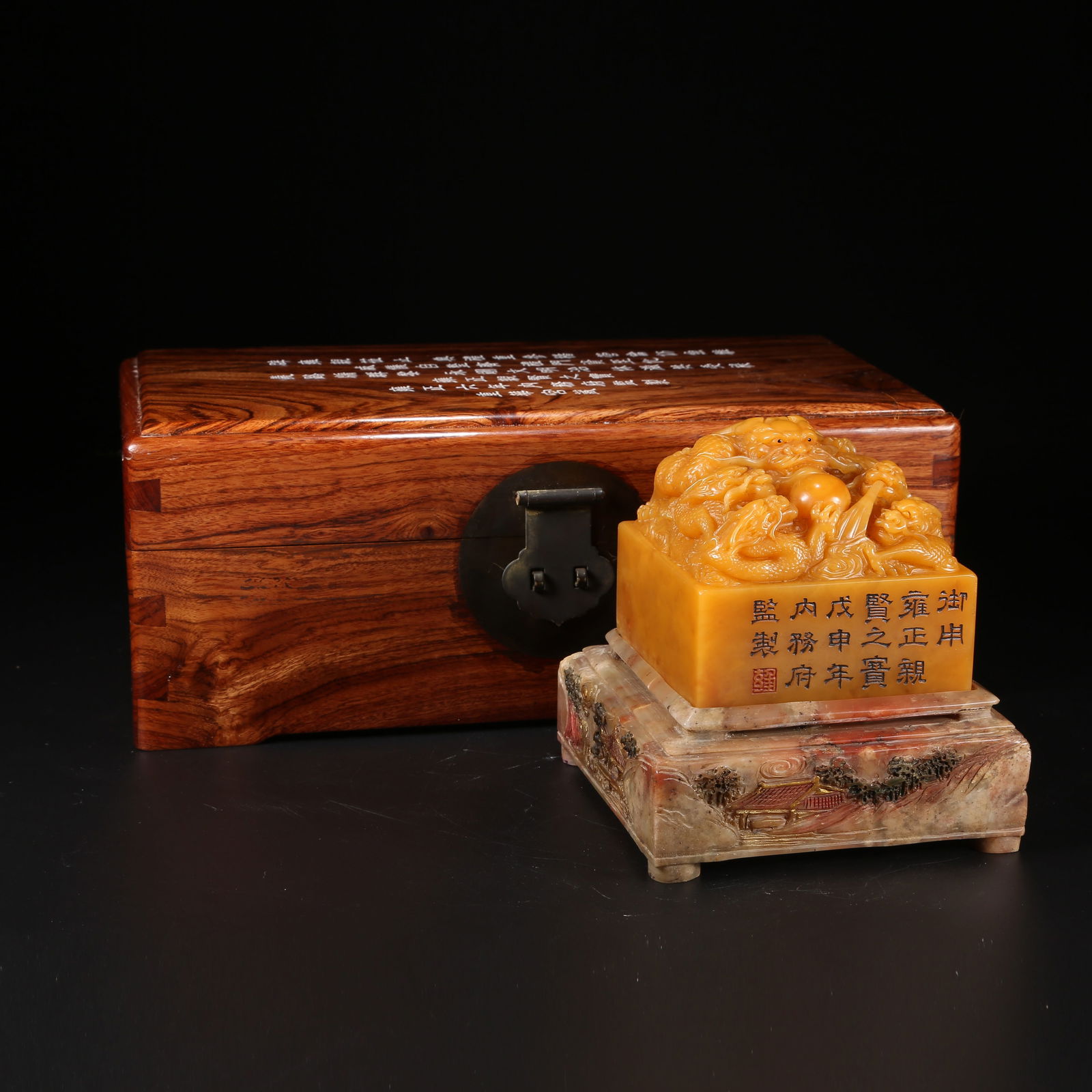 A SHOUSHAN TIANHUANG STONE SEAL WITH FIVE-DRAGON KNOB: Shoushan Tianhuang Stone Seal with Five-dragon Knob