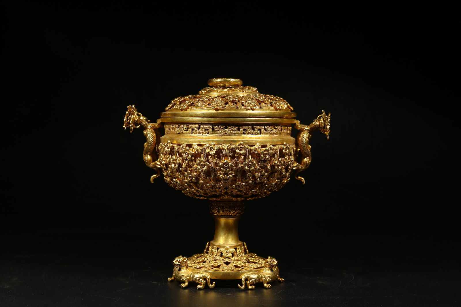 A GILDED BRONZE INCENSE BURNER WITH CHI-DRAGON MOTIF (1 of 9)
