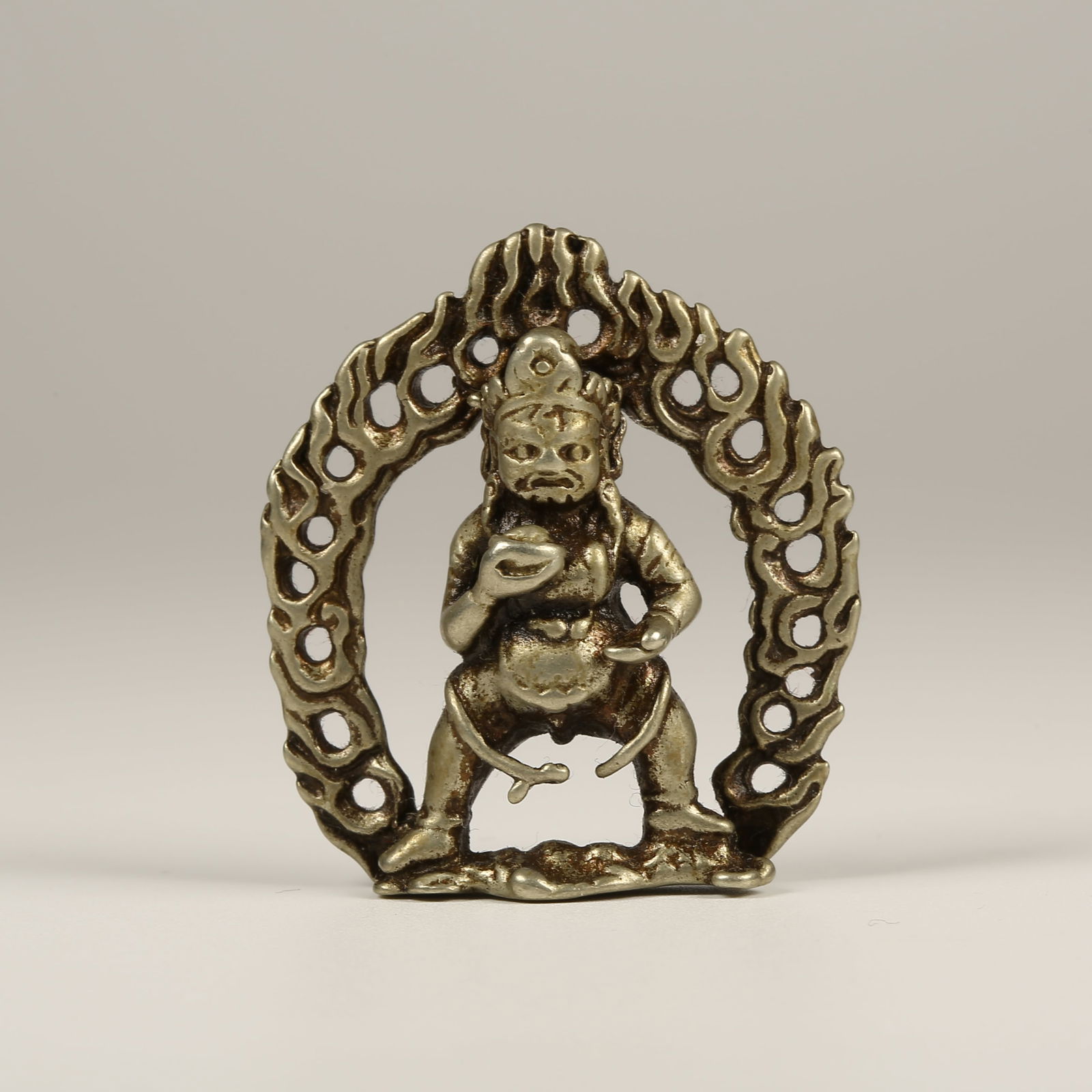 A SILVER BODHISATTVA WITH VAJRA-HAND PORTABLE ORNAMENT (1 of 8)