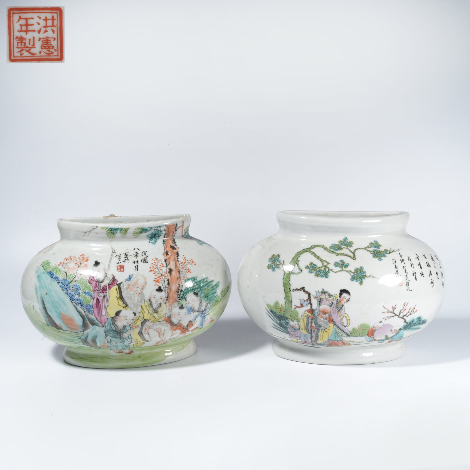 A FAMILLE-ROSE WALL VASES WITH FIGURAL NARRATIVE MOTIF (PAIR) (1 of 9)