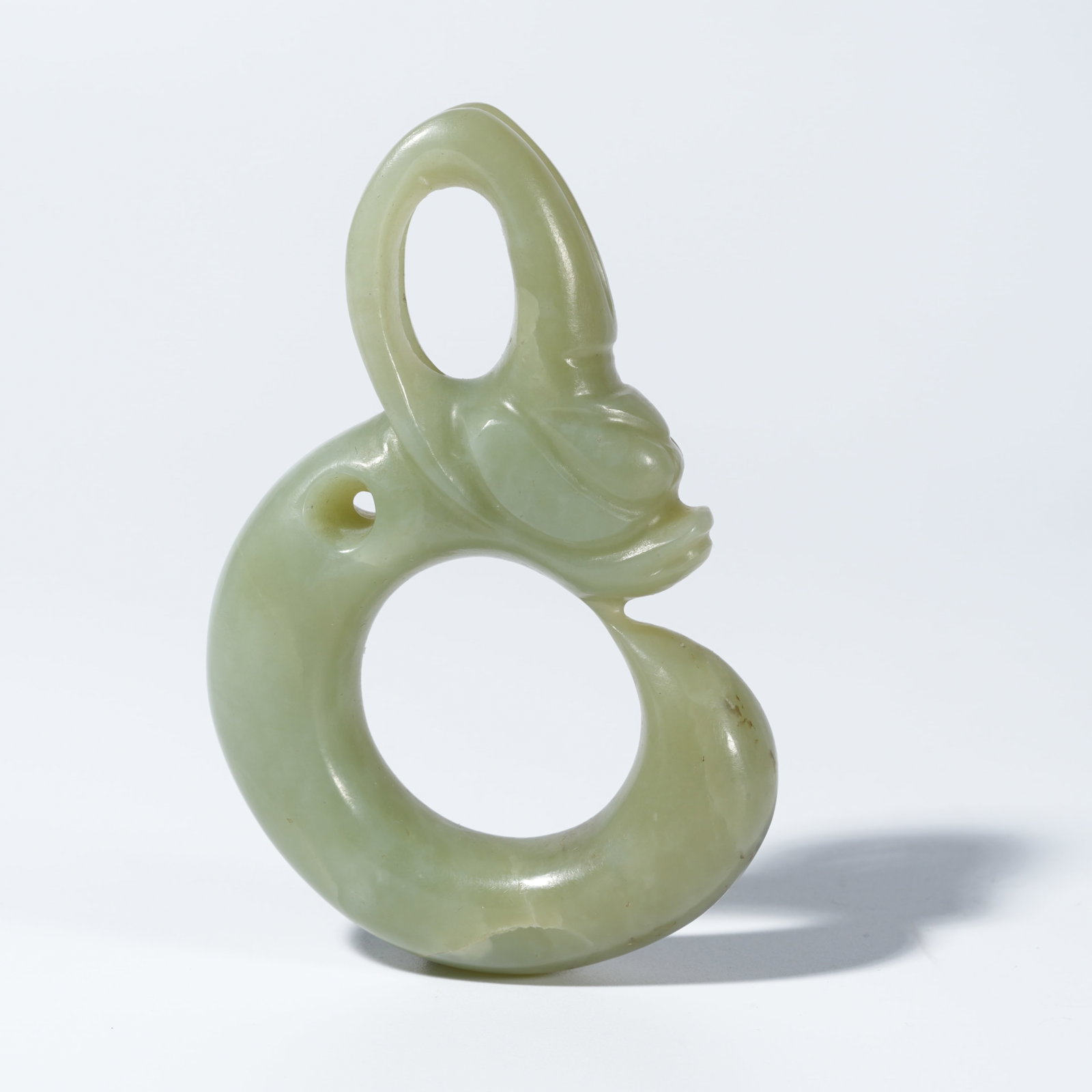 A ARCHAIC JADE CARVED PIG-DRAGON (1 of 10)