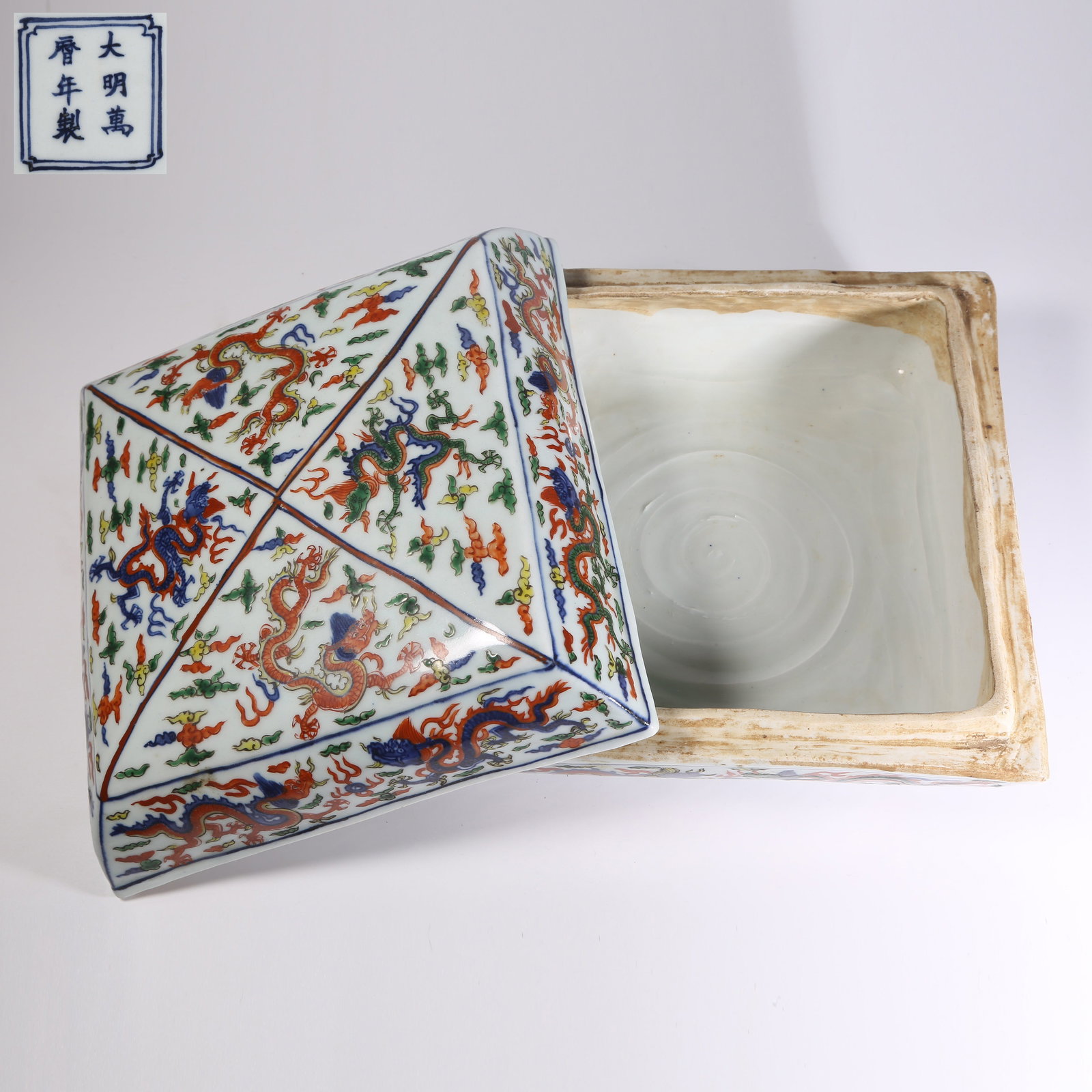 A DOUCAI COVERED BOX WITH CLOUD AND DRAGON MOTIFS (1 of 10)