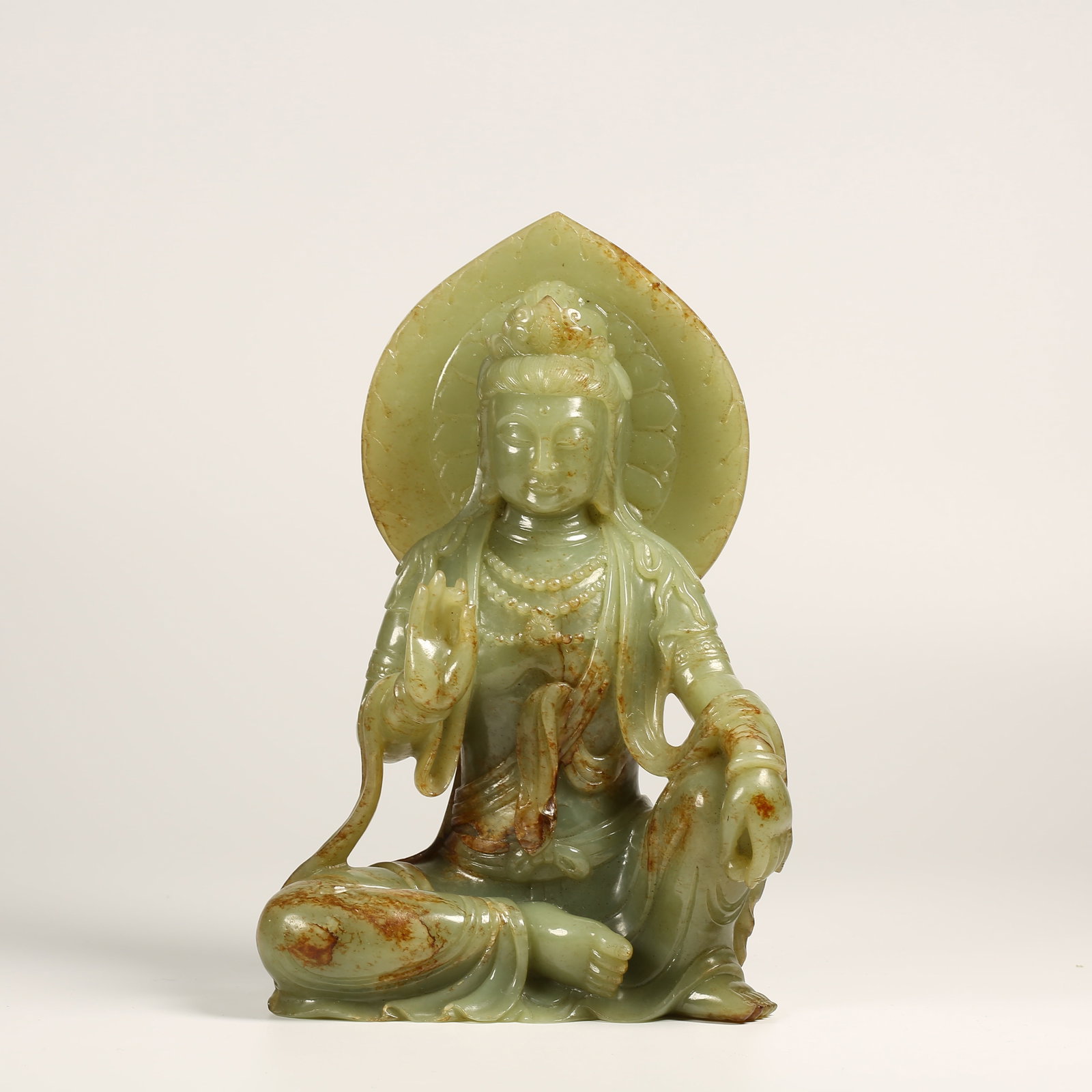 A MEDIEVAL JADE SEATED AVALOKITESHVARA FIGURE (1 of 8)