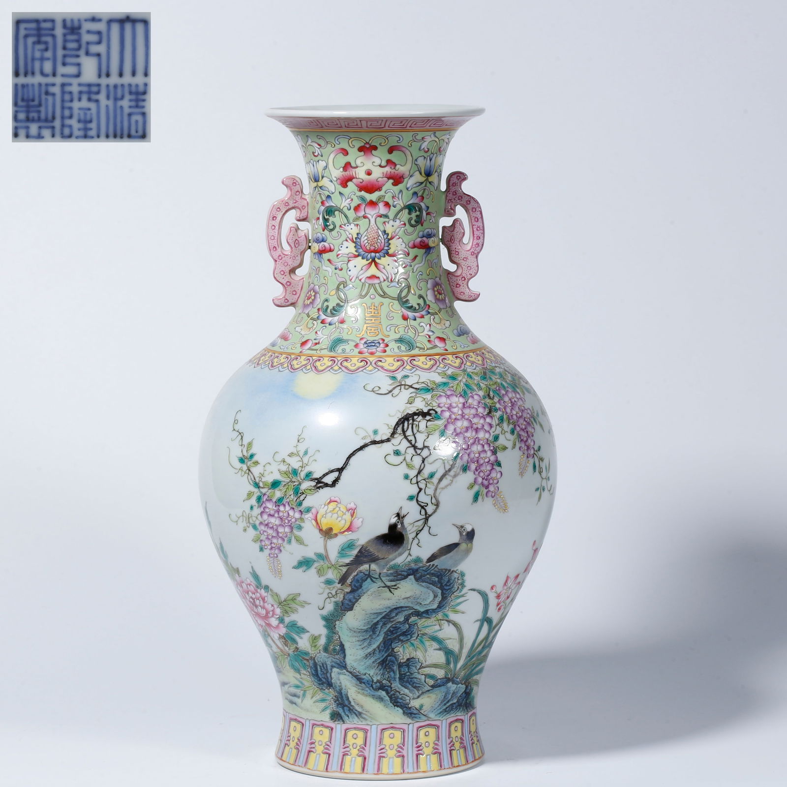A FAMILLE ROSE DOUBLE-EARED VASE WITH FLOWER-AND-BIRD DESIGN: Famille Rose Double-Eared Vase with Flower-and-Bird Design