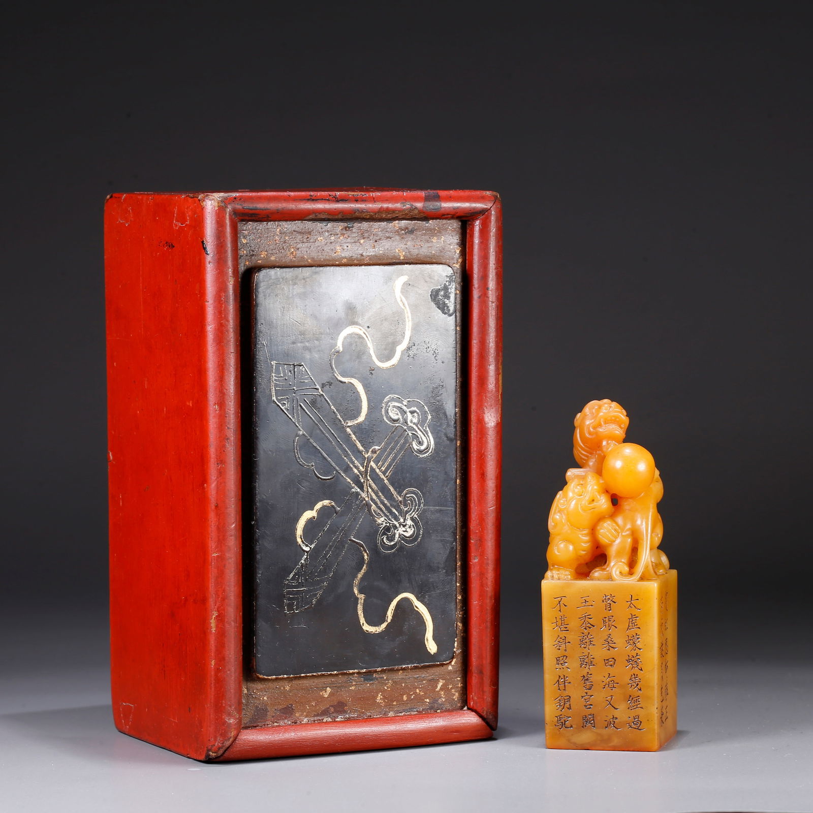 A SHOUSHAN TIANHUANG STONE SEAL WITH LION ROLLING BROCADE BALL KNOB: Shoushan Tianhuang stone seal with lion rolling brocade ball knob