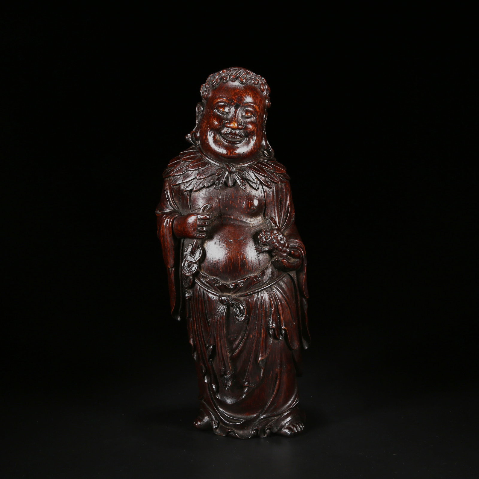 A BAMBOO ROOT CARVING OF LIU HAI PLAYING WITH A GOLDEN TOAD (1 of 9)