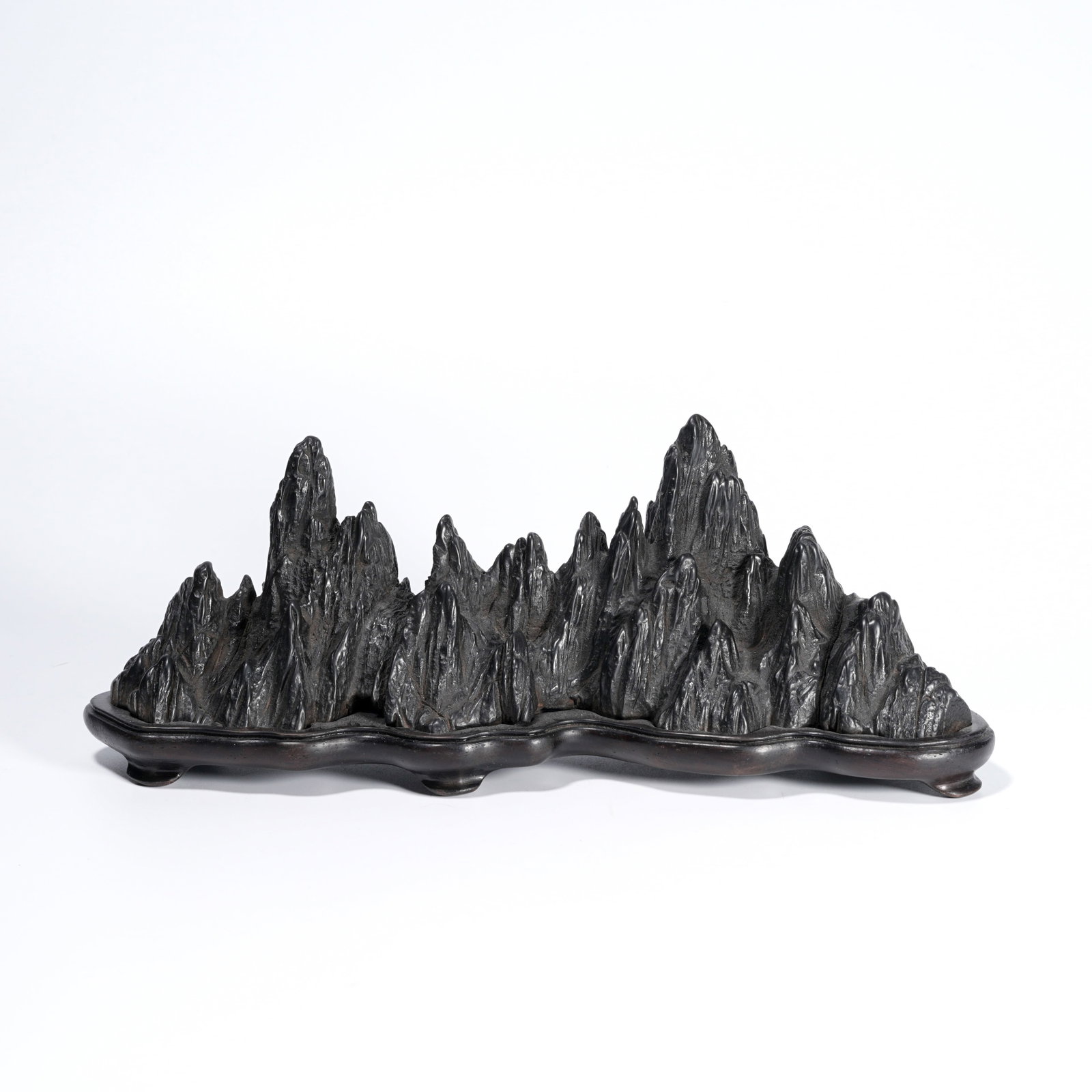 A STONE CARVED MOUNTAIN-FORM ORNAMENT: Stone Carved Mountain-Form Ornament