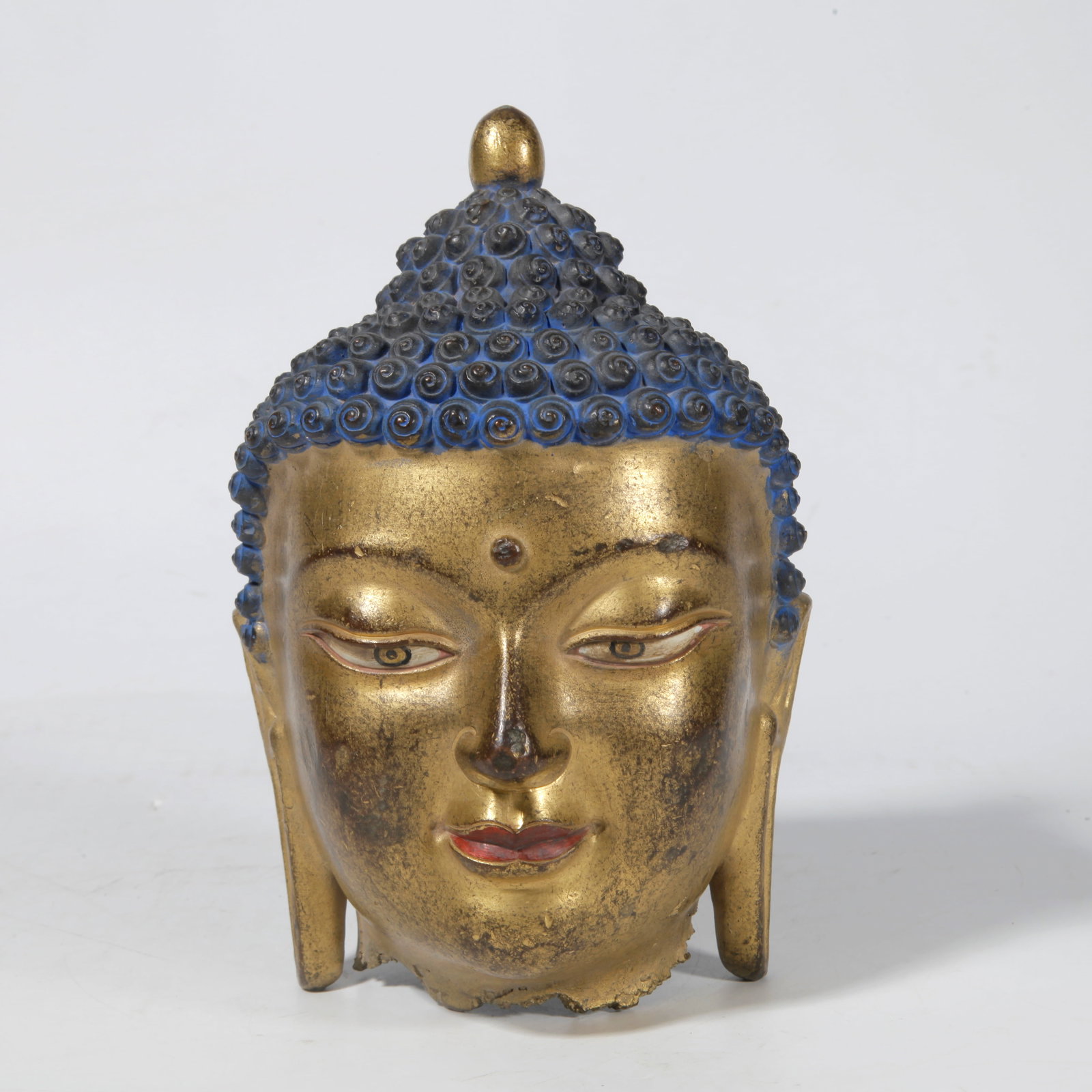 A GILT BRONZE BUDDHA HEAD (1 of 9)
