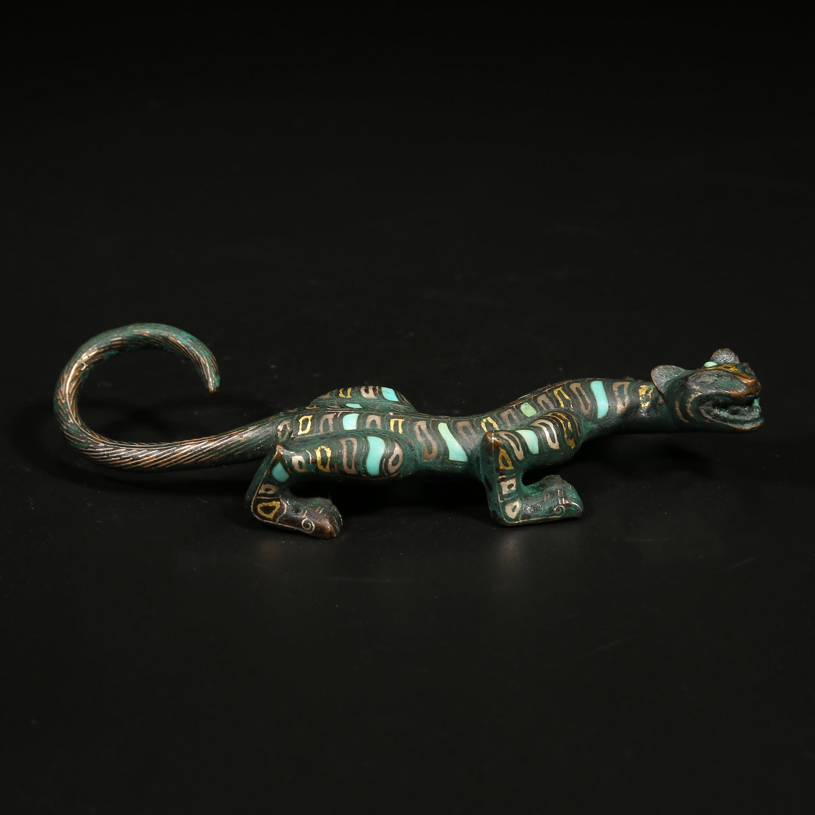 A GILT AND SILVER INLAID BRONZE CHI TIGER ORNAMENT (1 of 7)