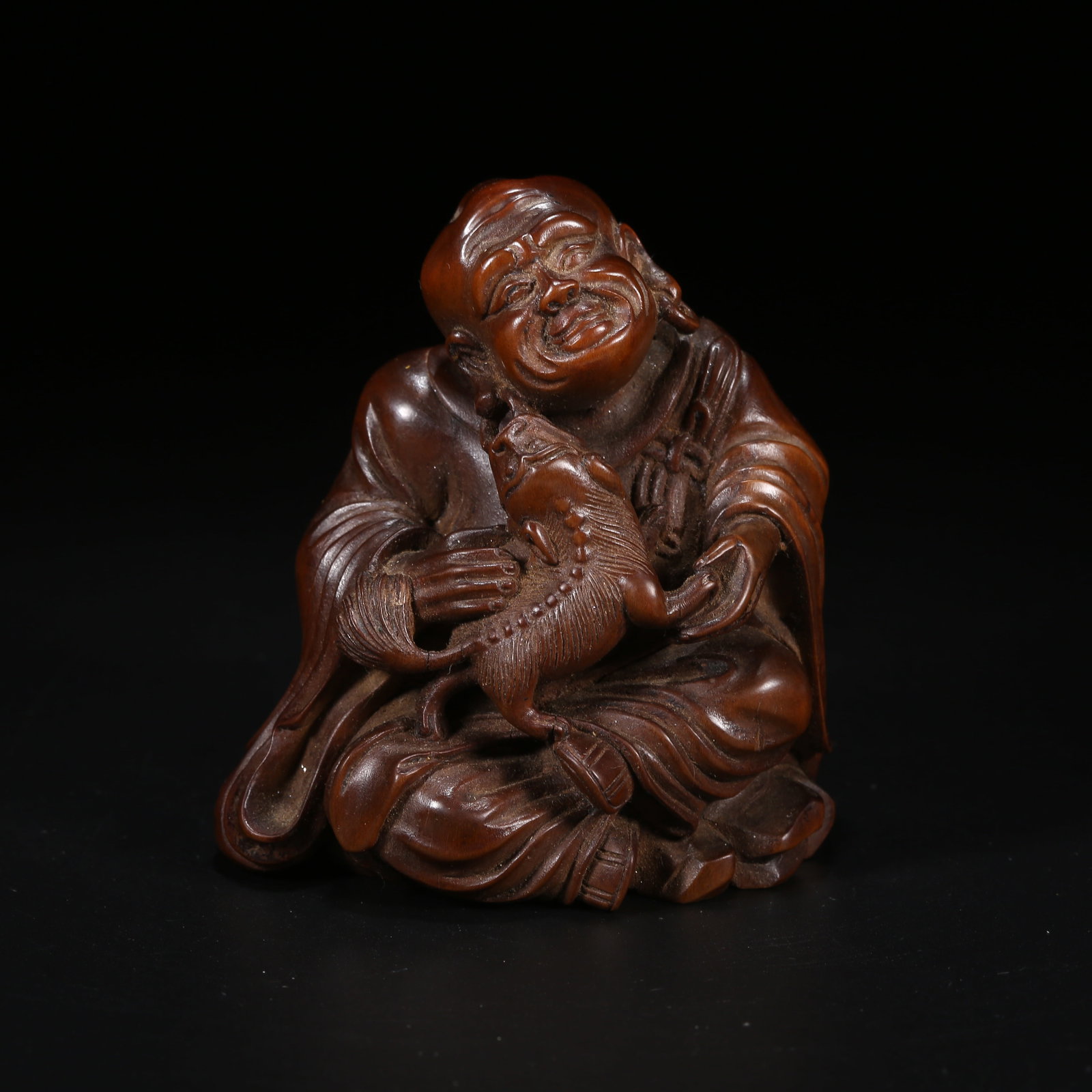 A BOXWOOD ARHAT ORNAMENT: Boxwood Arhat Ornament