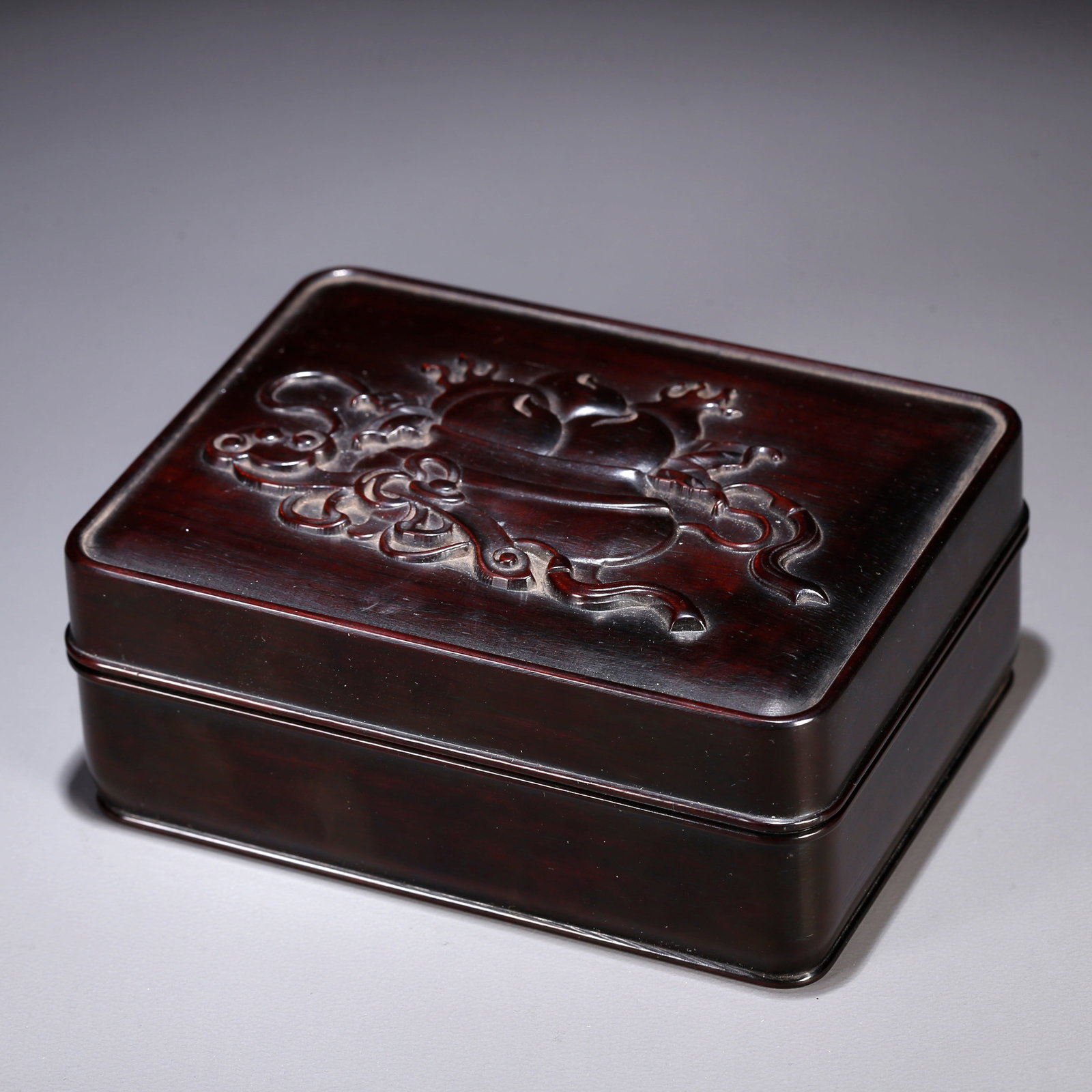 A ROSEWOOD CARVED COVERED BOX WITH LONGEVITY PEACH PATTERN (1 of 10)