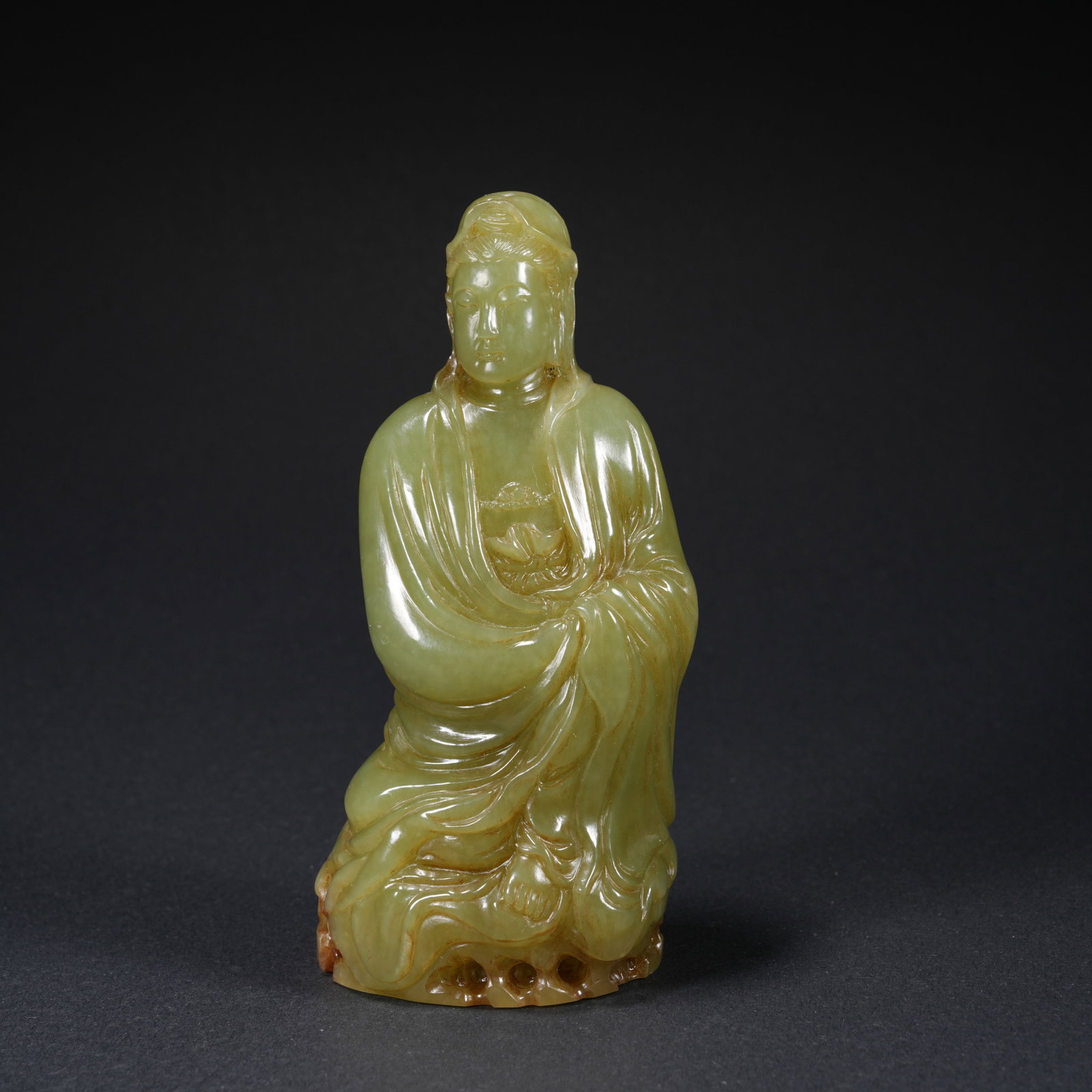 A HETIAN YELLOW JADE CARVED GUANYIN FIGURE: Hetian Yellow Jade Carved Guanyin Figure