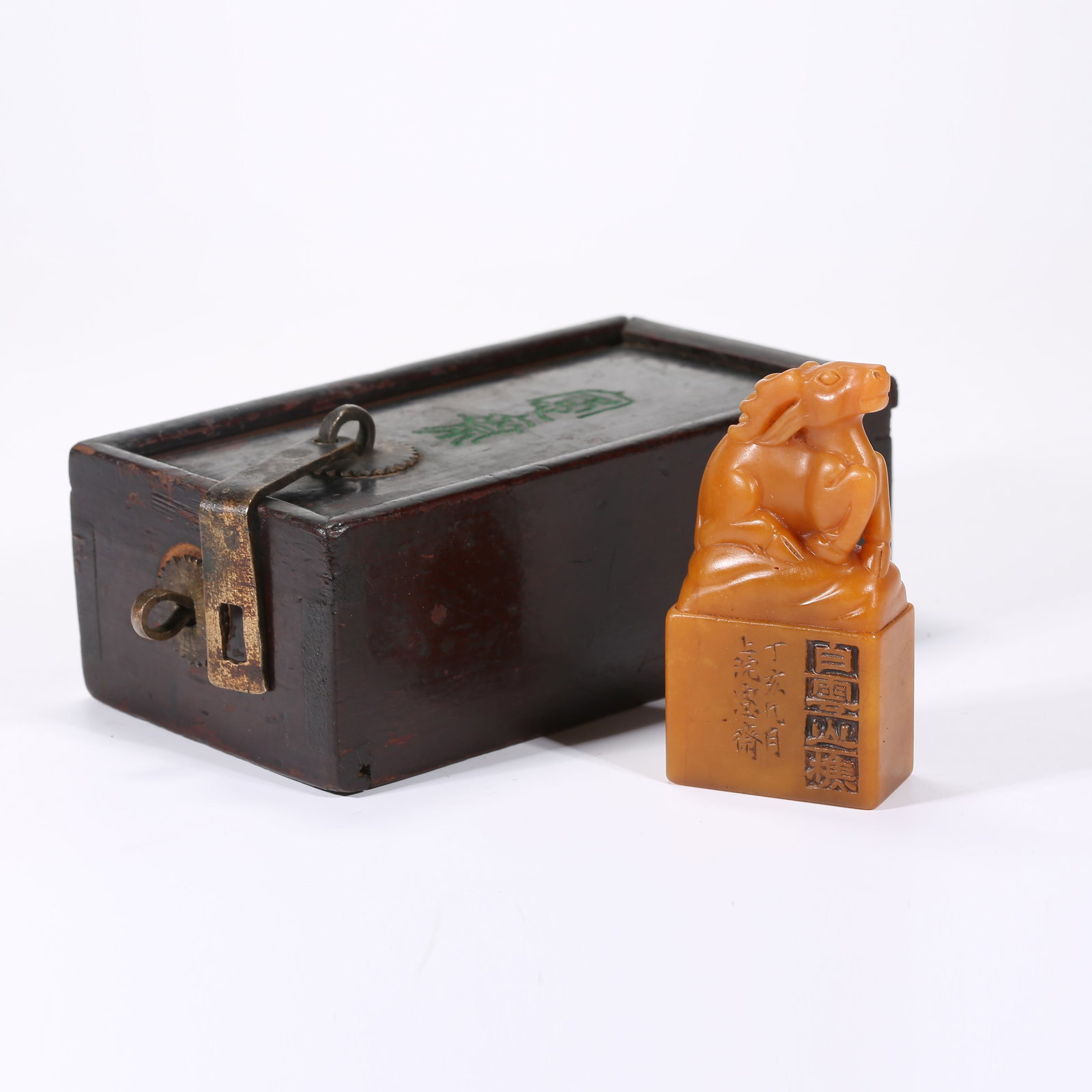 A SHOUSHAN TIANHUANG STONE SEAL WITH DEER FINIAL: Shoushan Tianhuang stone seal with deer finial