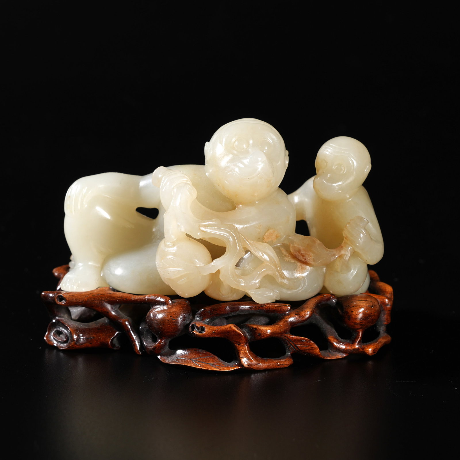 A HETIAN JADE CARVED MONKEY-FORM ORNAMENT (1 of 9)
