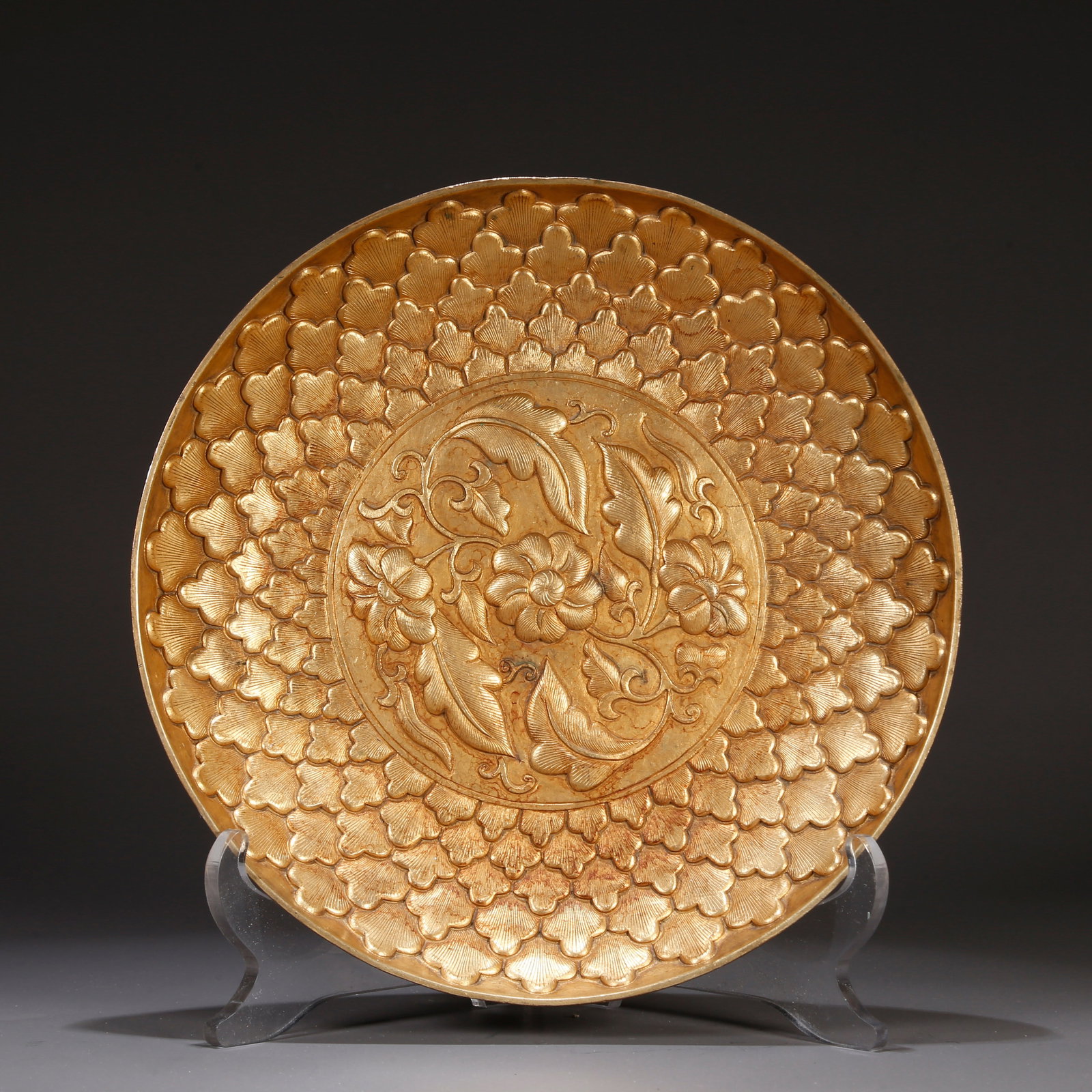 A GILT BRONZE PLATE WITH FLORAL DESIGN (1 of 9)