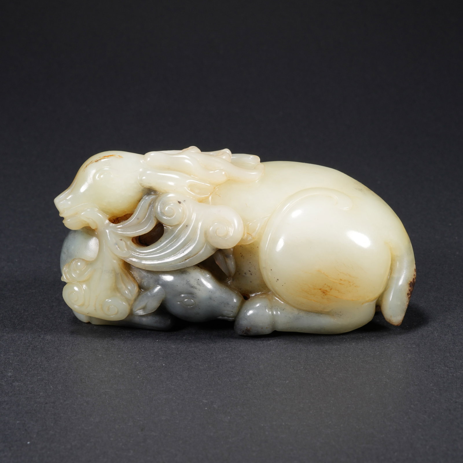 A HETIAN JADE CARVED DEER FIGURE (1 of 10)