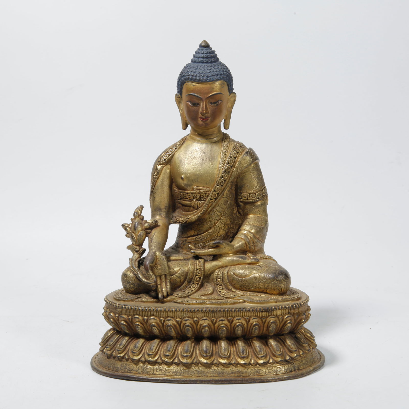 A GILT BRONZE MEDICINE BUDDHA STATUE (1 of 9)